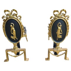 Pair of Louis XVI Style Figural Brass and Iron Ribbon Decorated  Andirons