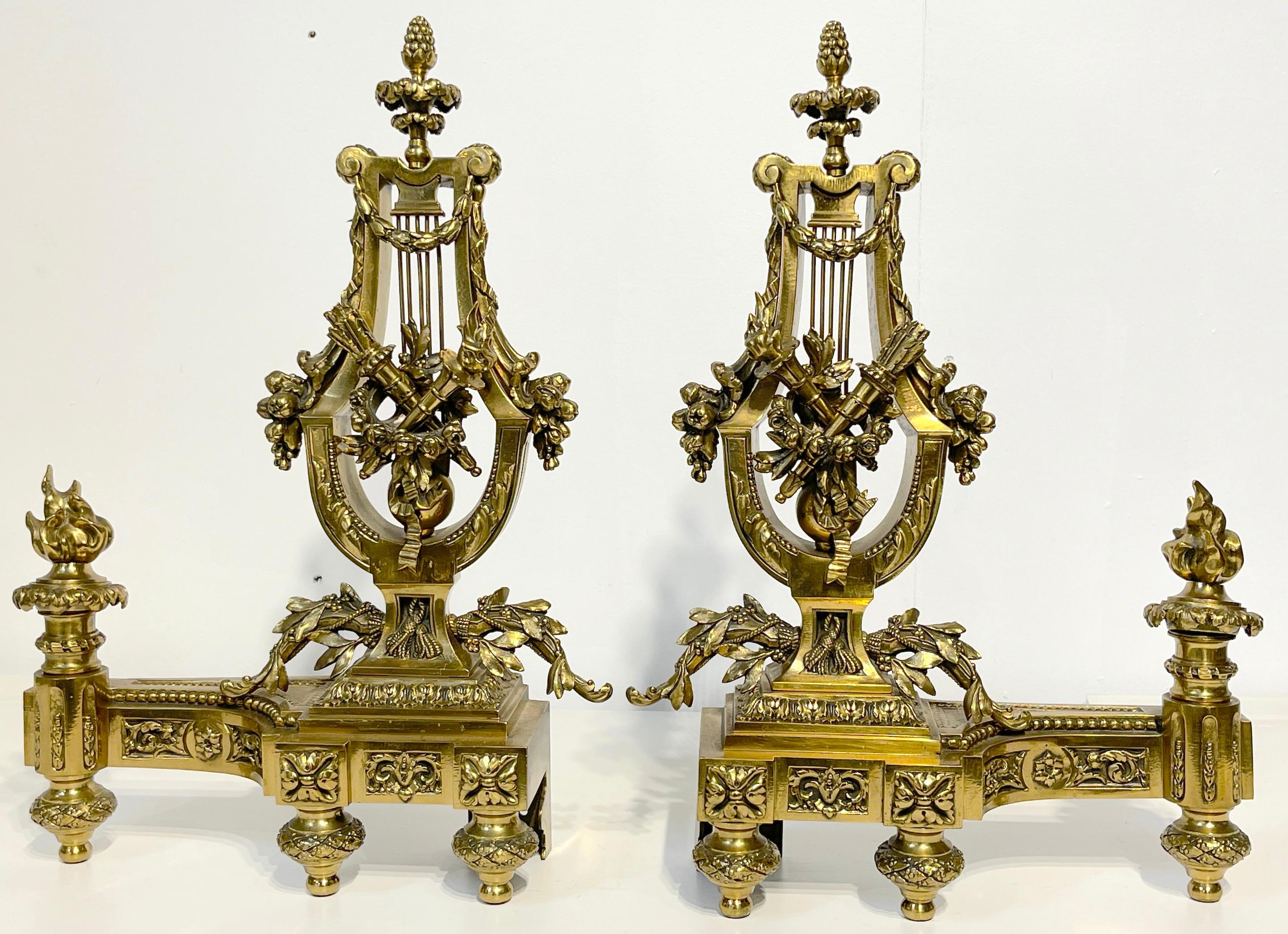 A pair of Louis XVI style French gilt bronze Lyre chenets/andirons, Signed V.B.
France, Circa 1890s
A fine pair of Louis XVI Neoclassical style Chenets/Andirons, Each one with finely casting the top with Acorn finial, with a fruit and flower