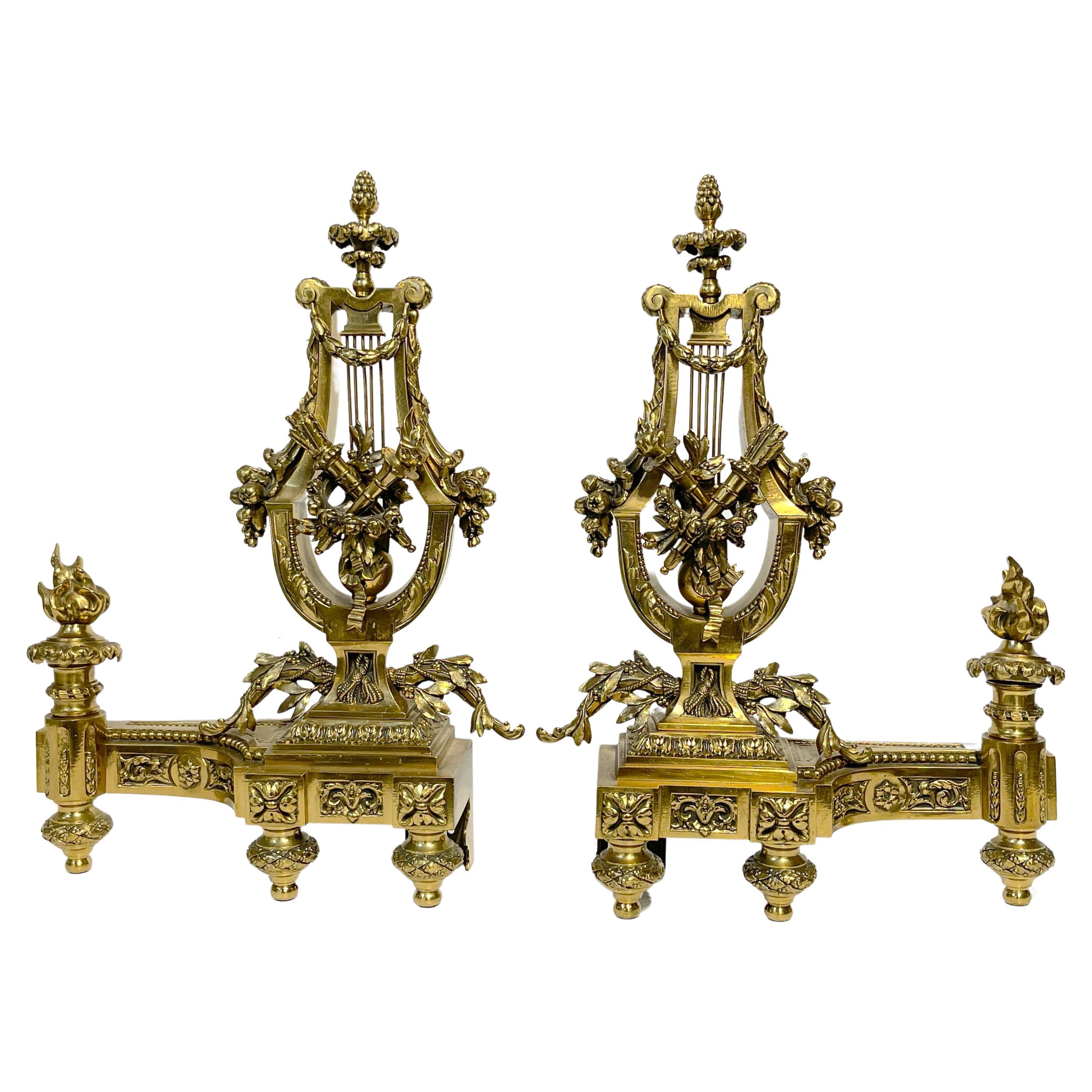 Pair of Louis XVI Style French Gilt Bronze Lyre Chenets/Andirons, Signed V.B. For Sale