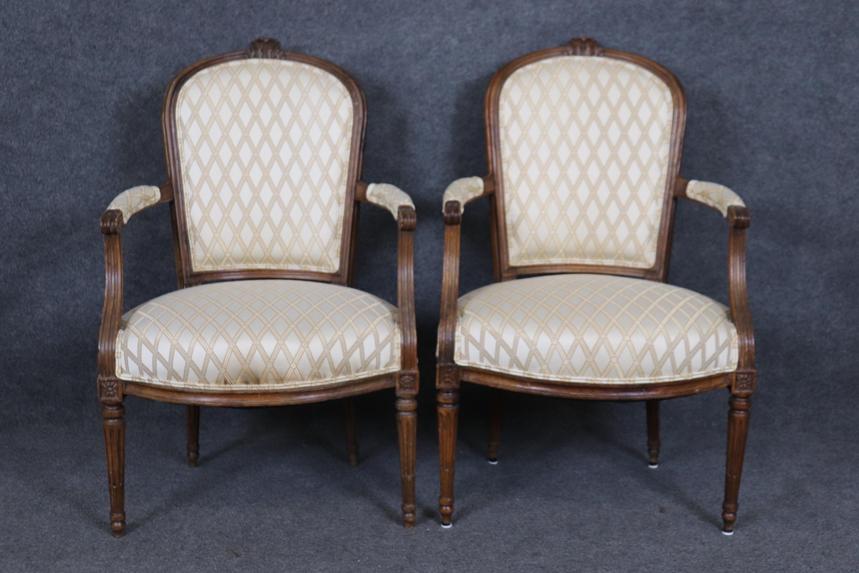 These are classic chairs and are in good condition. The chairs have normal signs of wear and use. They have nice older upholstery and may have signs of use including minor staining not shown in photos. Measures 37.25 tall x 24 wide x 25 deep and