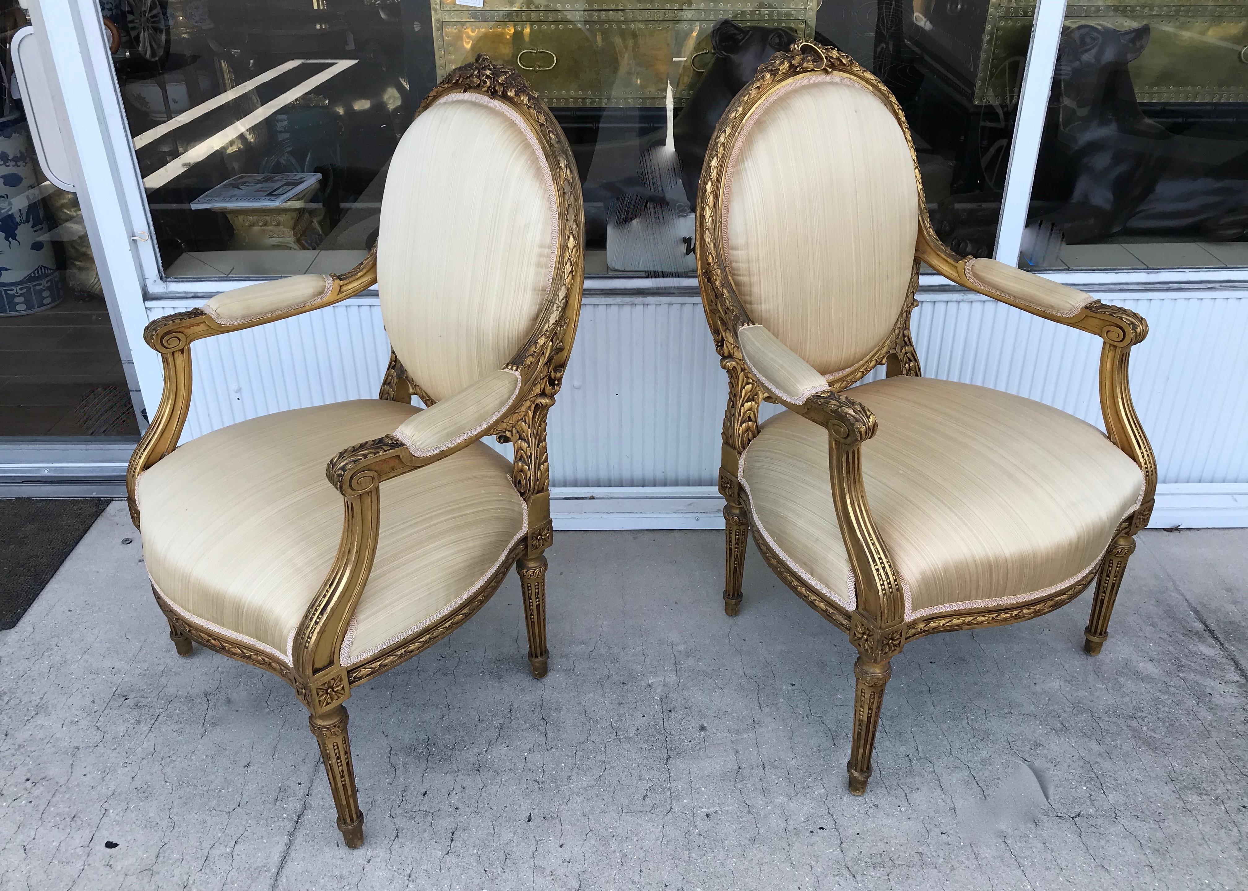 Pair of Louis XVI Style Gilded Arm Chairs In Good Condition In West Palm Beach, FL