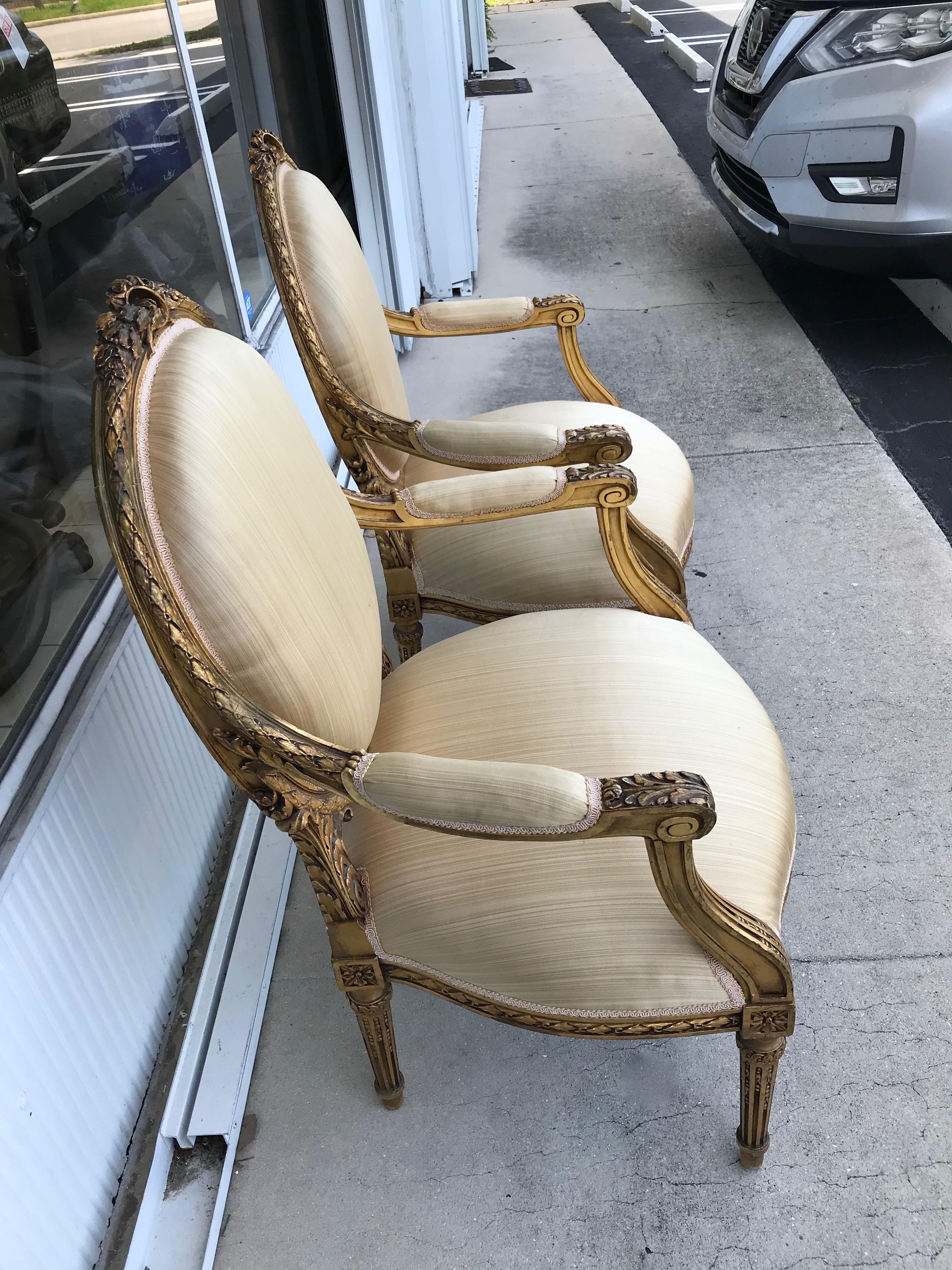 Early 20th Century Pair of Louis XVI Style Gilded Arm Chairs