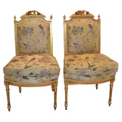 Antique Pair of Louis XVI style gilded, hand carved side chairs, yellow silk fabric.