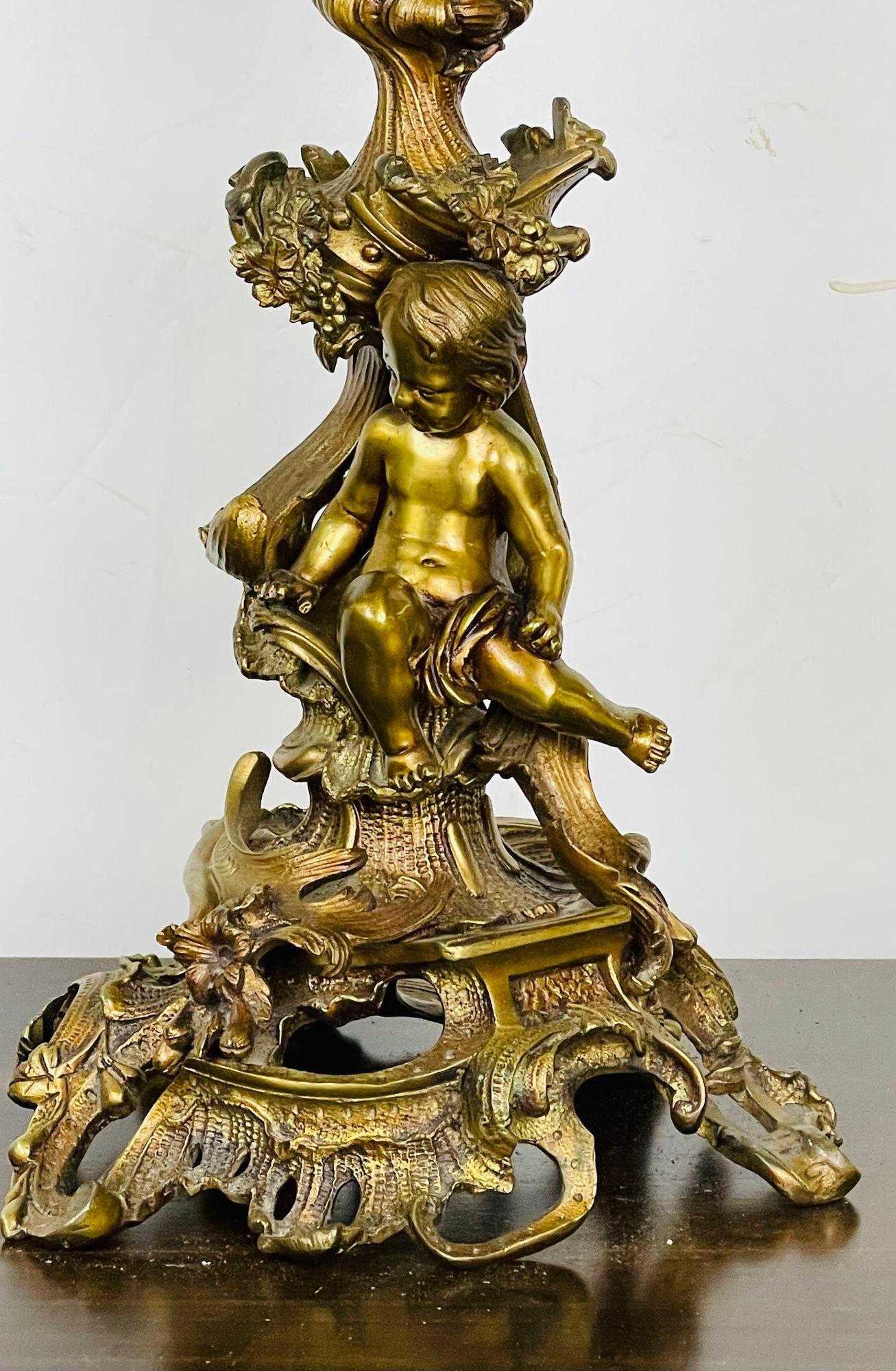 Pair of Louis XVI Style Gilt Bronze Candelabra, Cherub Florentine Form In Good Condition For Sale In Stamford, CT