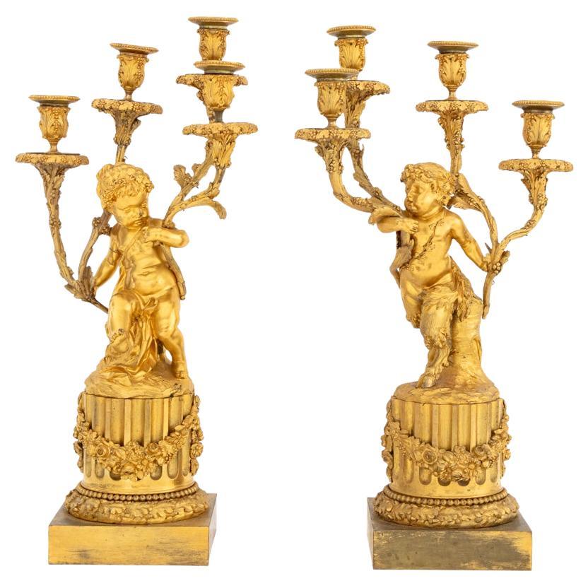 Paire de candélabres en bronze doré de style Louis XVI