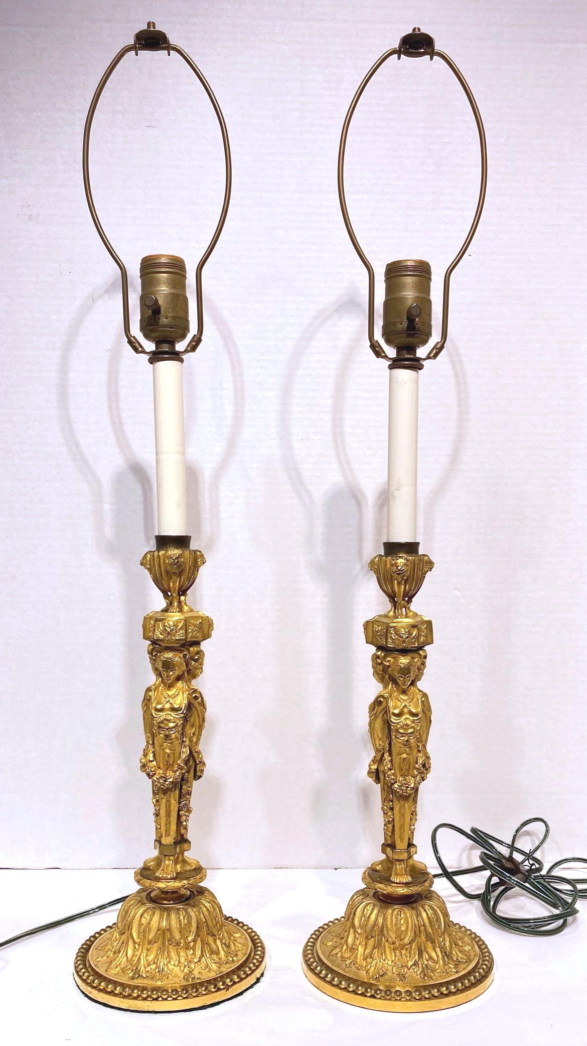 Pair of very fine quality French 19 century Louis XVI style gilt bronze candlestick lamps after the original design by Jean Démosthène Dugourc (1749-1825).