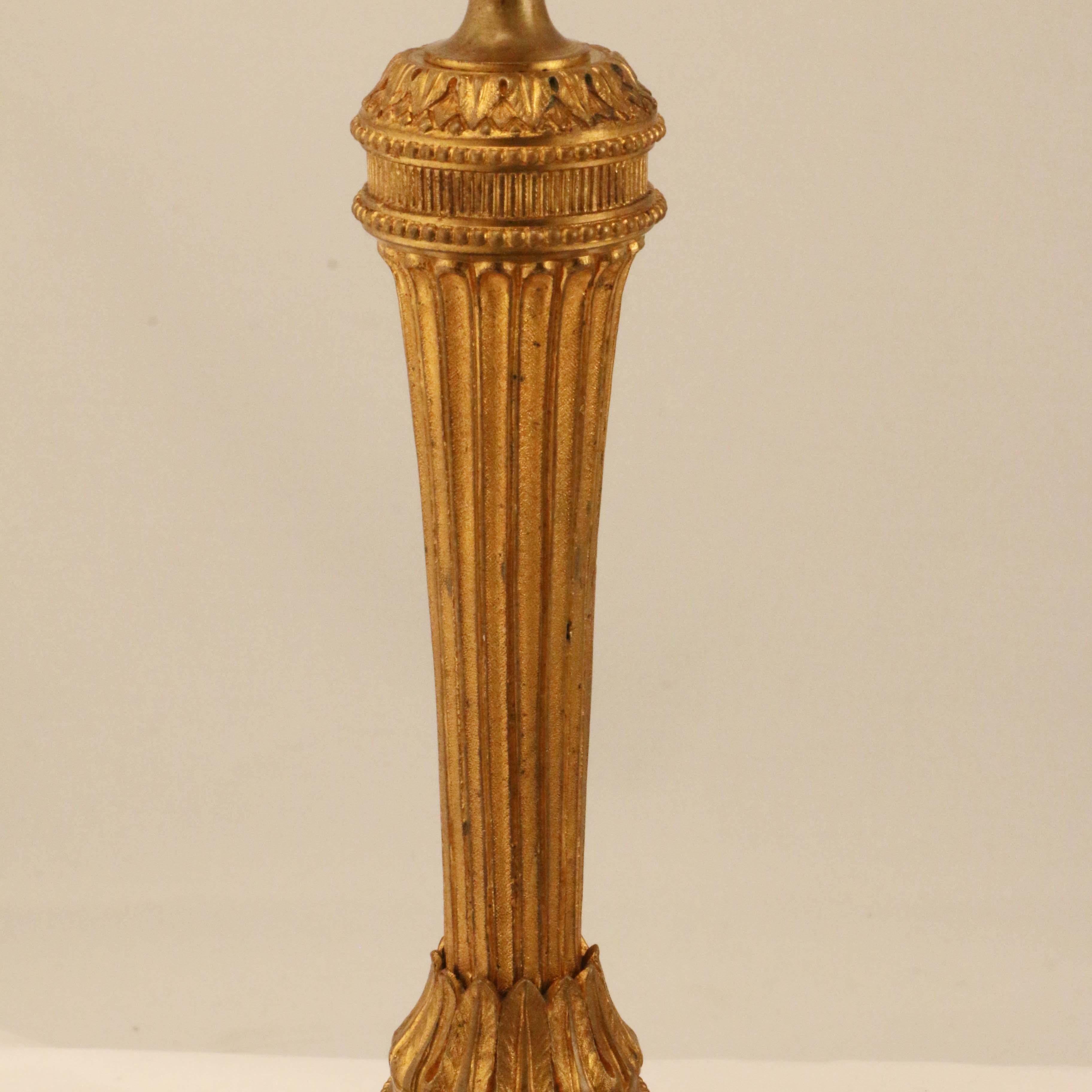 Pair of Louis XVI Style Gilt Bronze Candlesticks In Good Condition For Sale In Montreal, QC