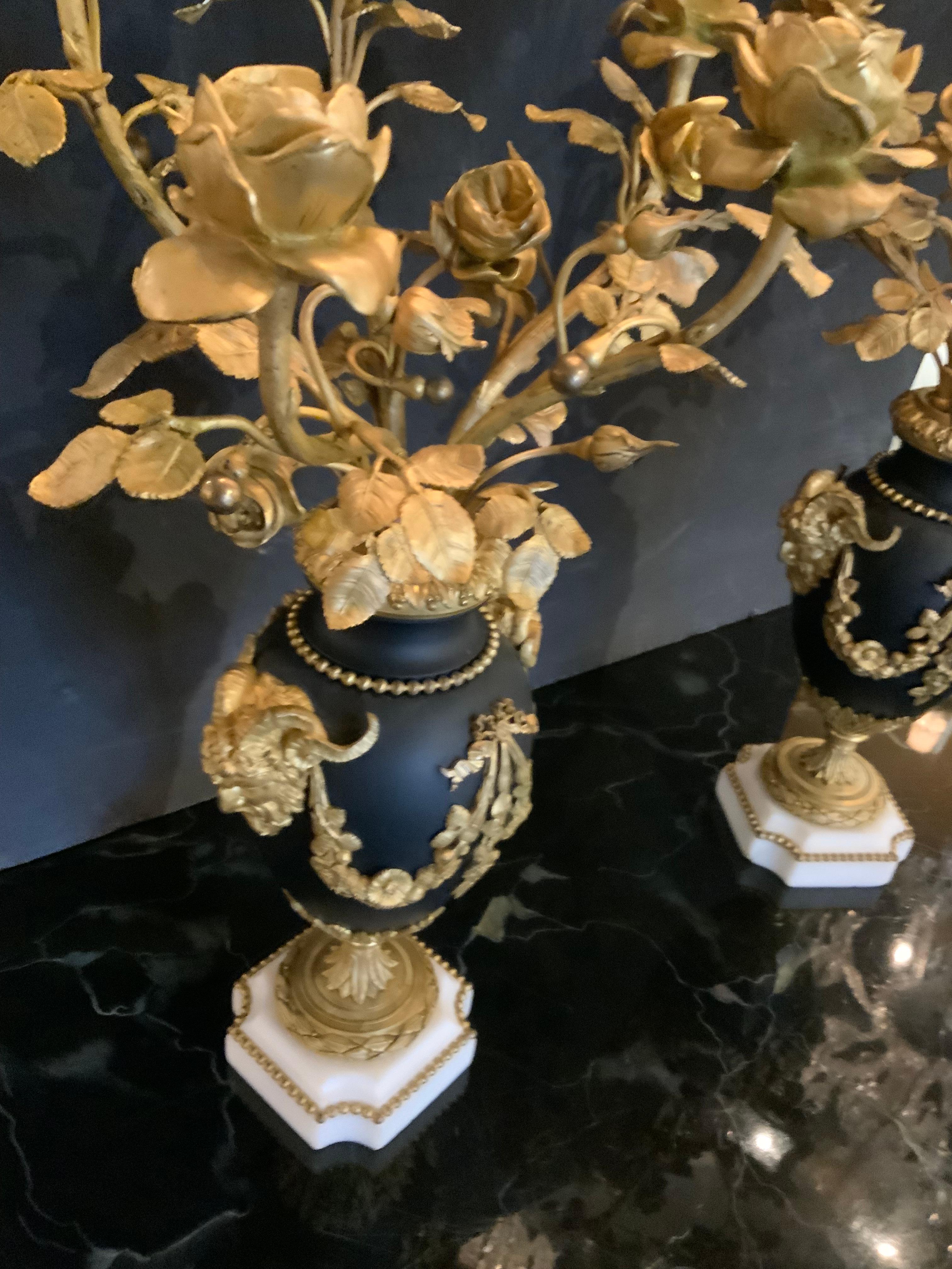 French Pair of Louis XVI Style gilt bronze five light candelabra, 19 th c. For Sale
