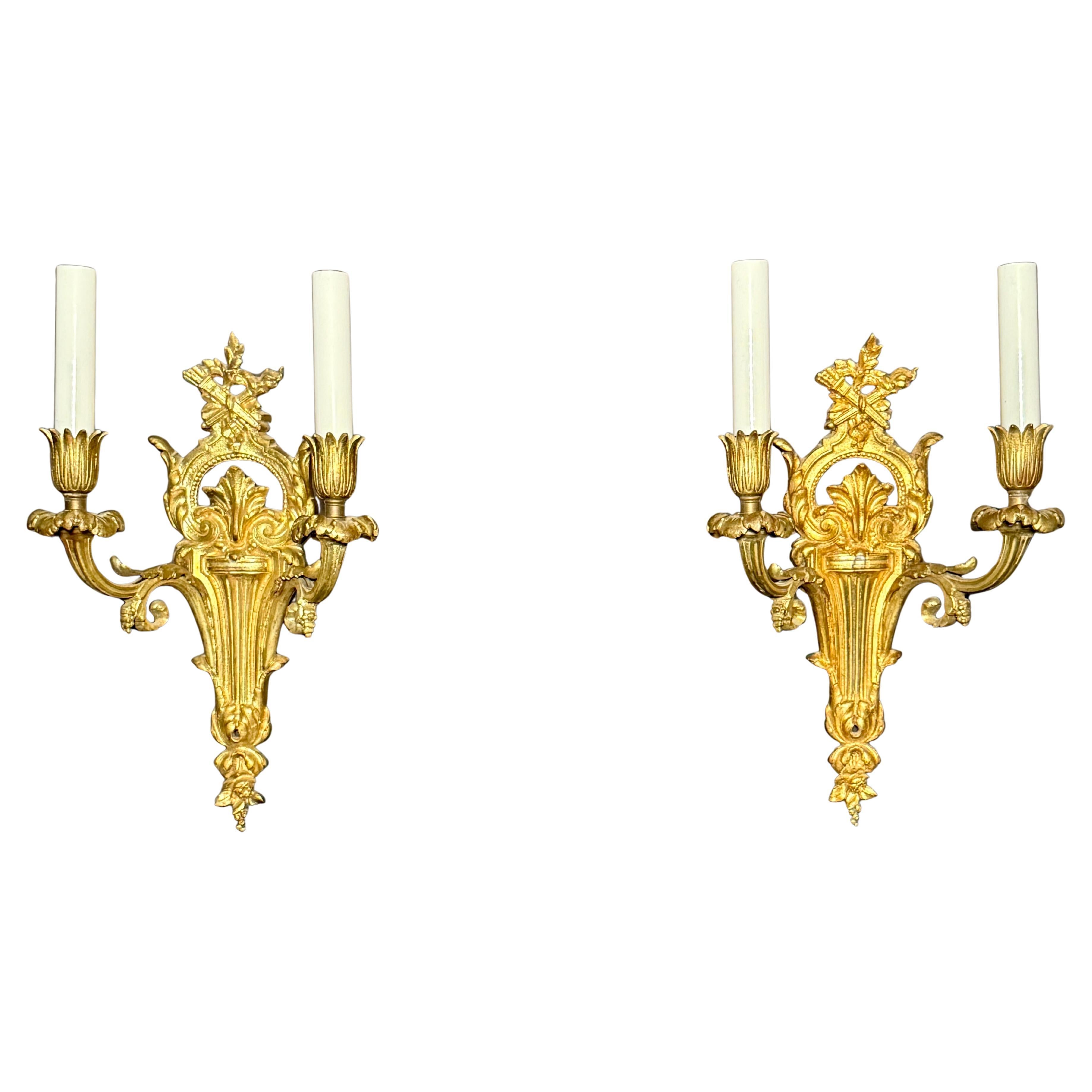 Pair Of Louis XVI Style Gilt Bronze Two Arm Wall Sconces For Sale