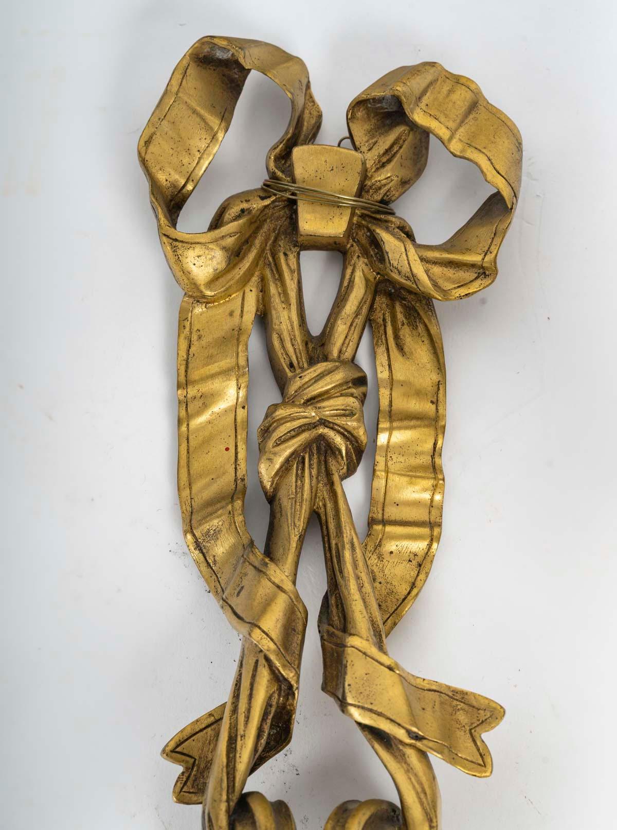 Pair of Louis XVI style gilt bronze wall lights, 19th century, Napoleon III period.

Pair of 19th century Louis XVI style wall lights, Napoleon III period, in gilt bronze.
H: 49cm, W: 31cm, D: 15cm