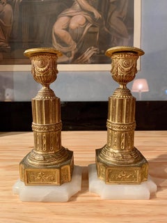 Pair of Louis XVI Style Gilt Metal and Alabaster Candlesticks