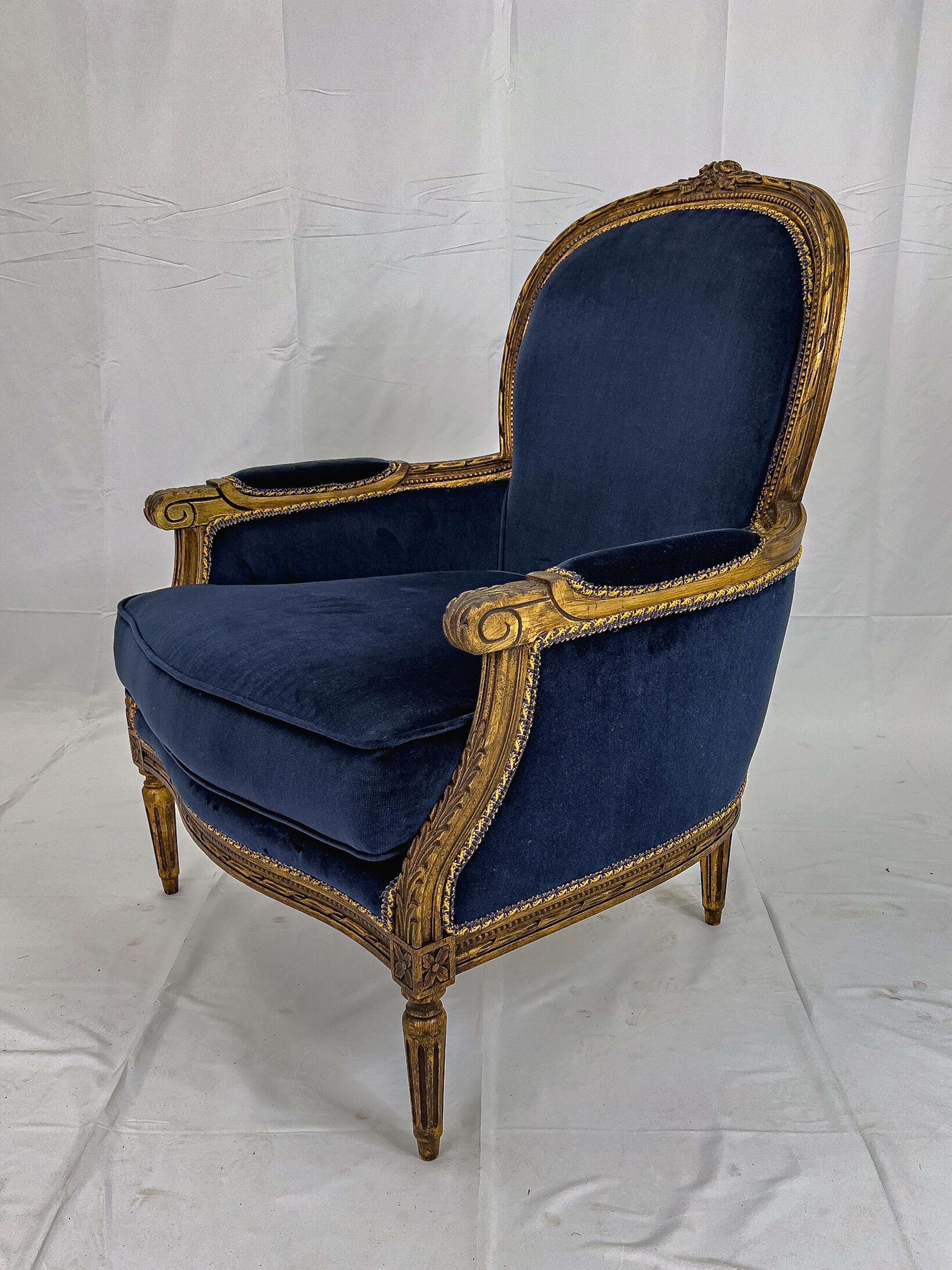 Carved Pair of Louis XVI Style Gilt Wood Blue Velvet Bergère Chairs