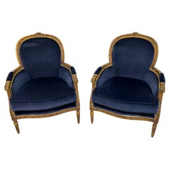 Pair of Louis XVI Style Gilt Wood Blue Velvet Bergère Chairs