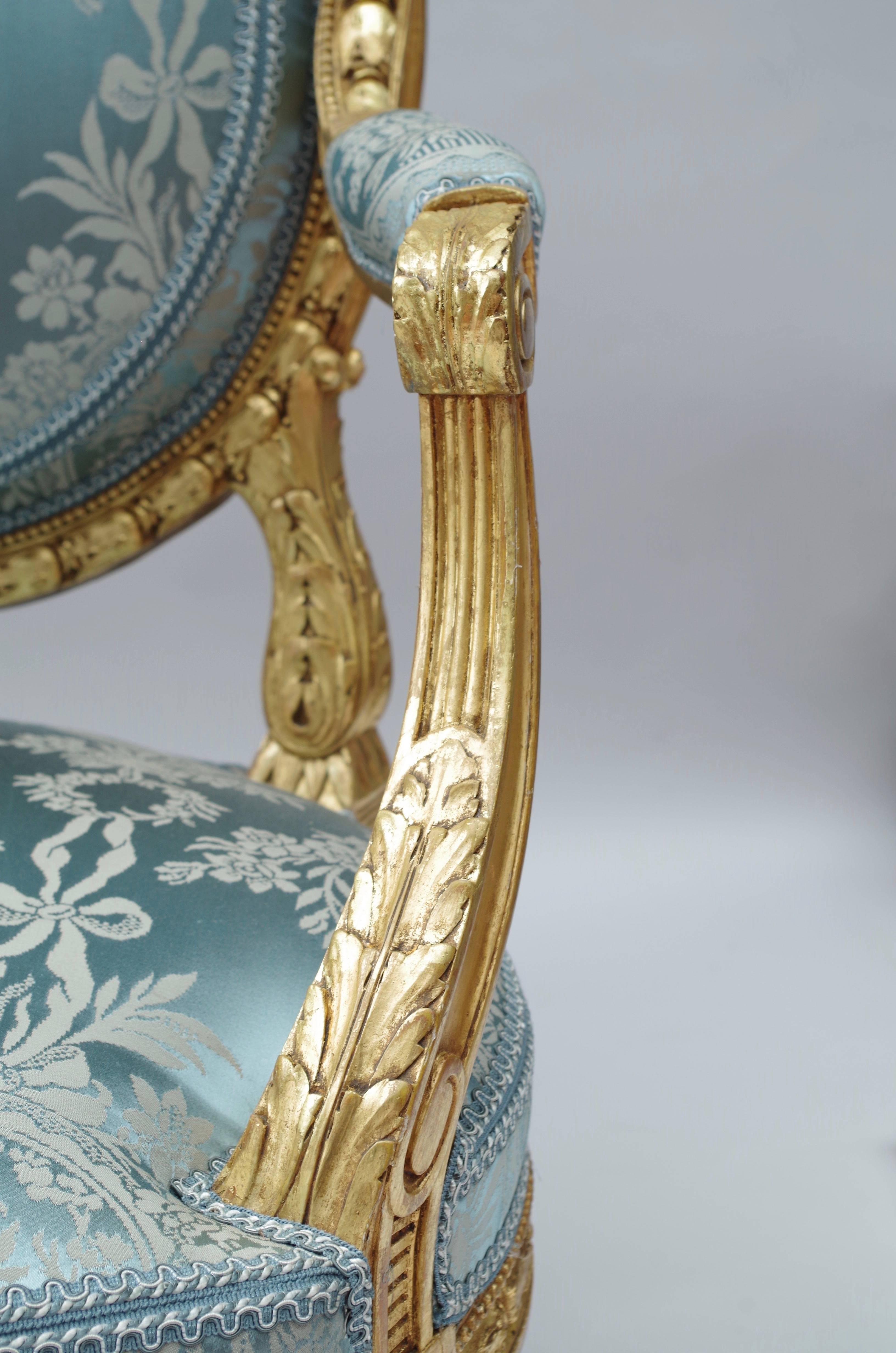 Late 19th Century Pair of Louis XVI Style Giltwood Armchairs, Medallion Shape Backrest, circa 1880