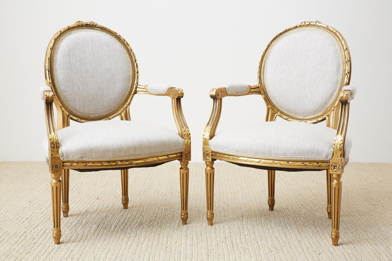 French Pair of Louis XVI Style Giltwood Linen Fauteuil Armchairs