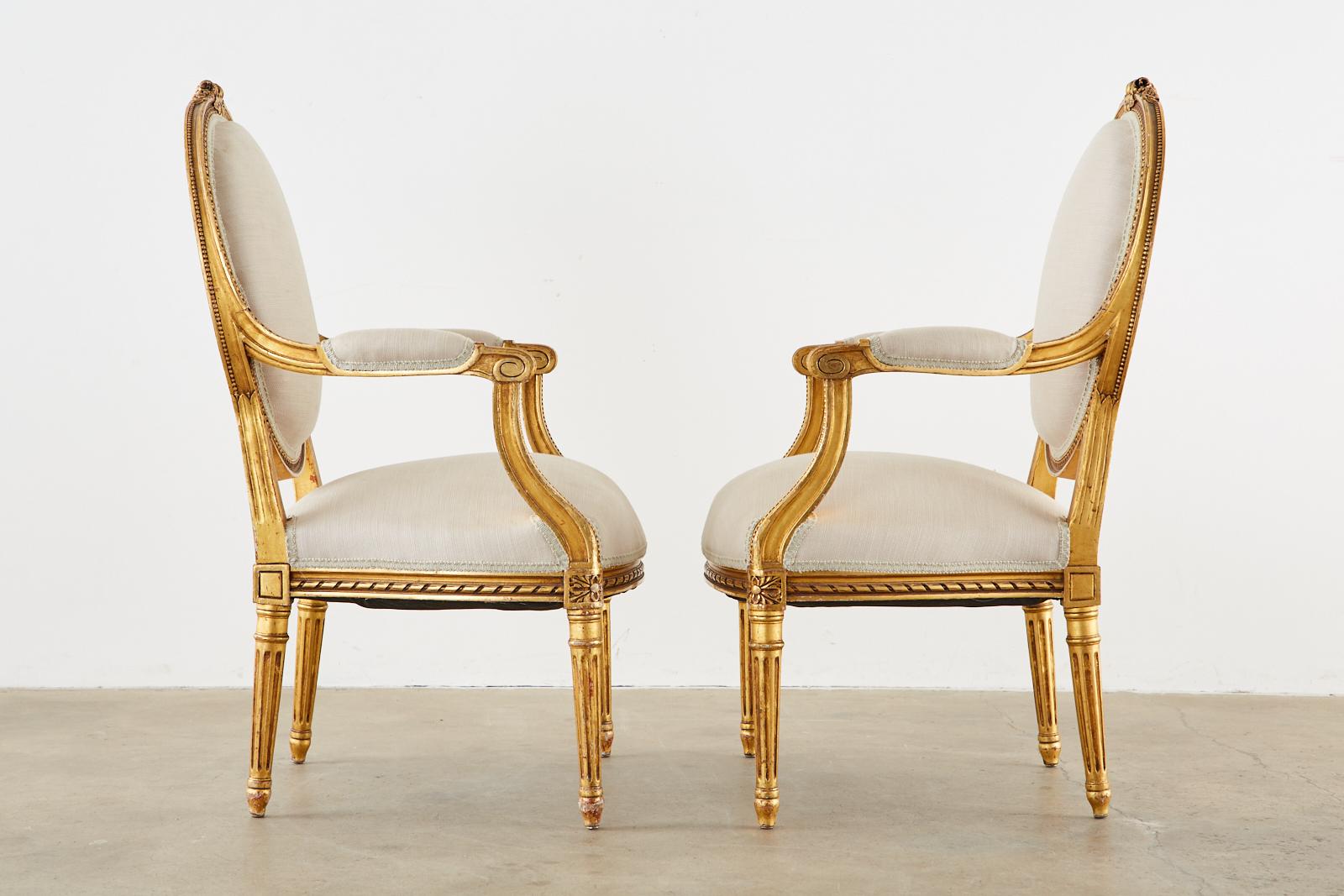 Hand-Crafted Pair of Louis XVI Style Giltwood Linen Fauteuil Armchairs