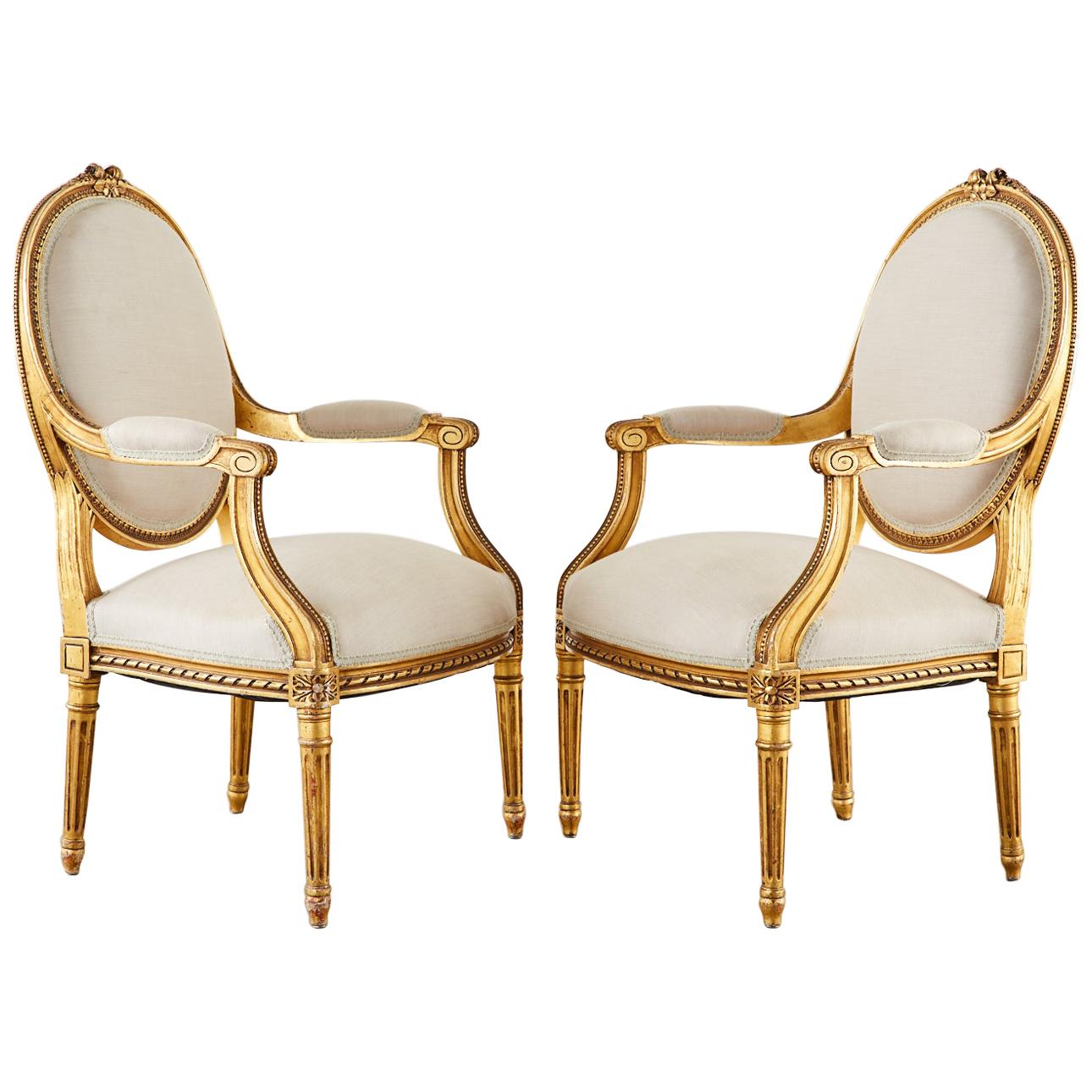 Pair of Louis XVI Style Giltwood Linen Fauteuil Armchairs