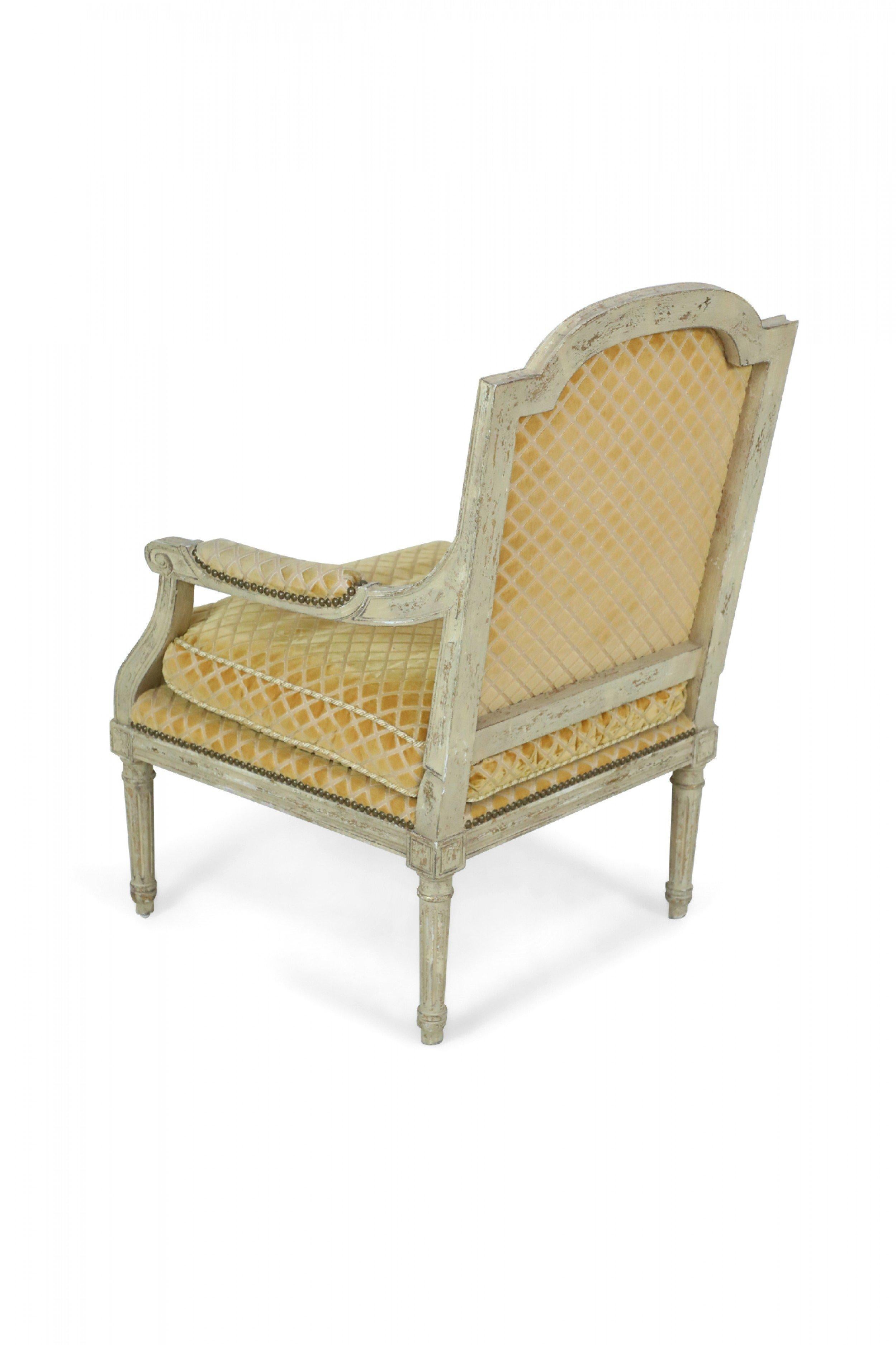 20th Century Pair of Louis XVI-Style Gold Upholstered Fauteuils / Armchairs For Sale