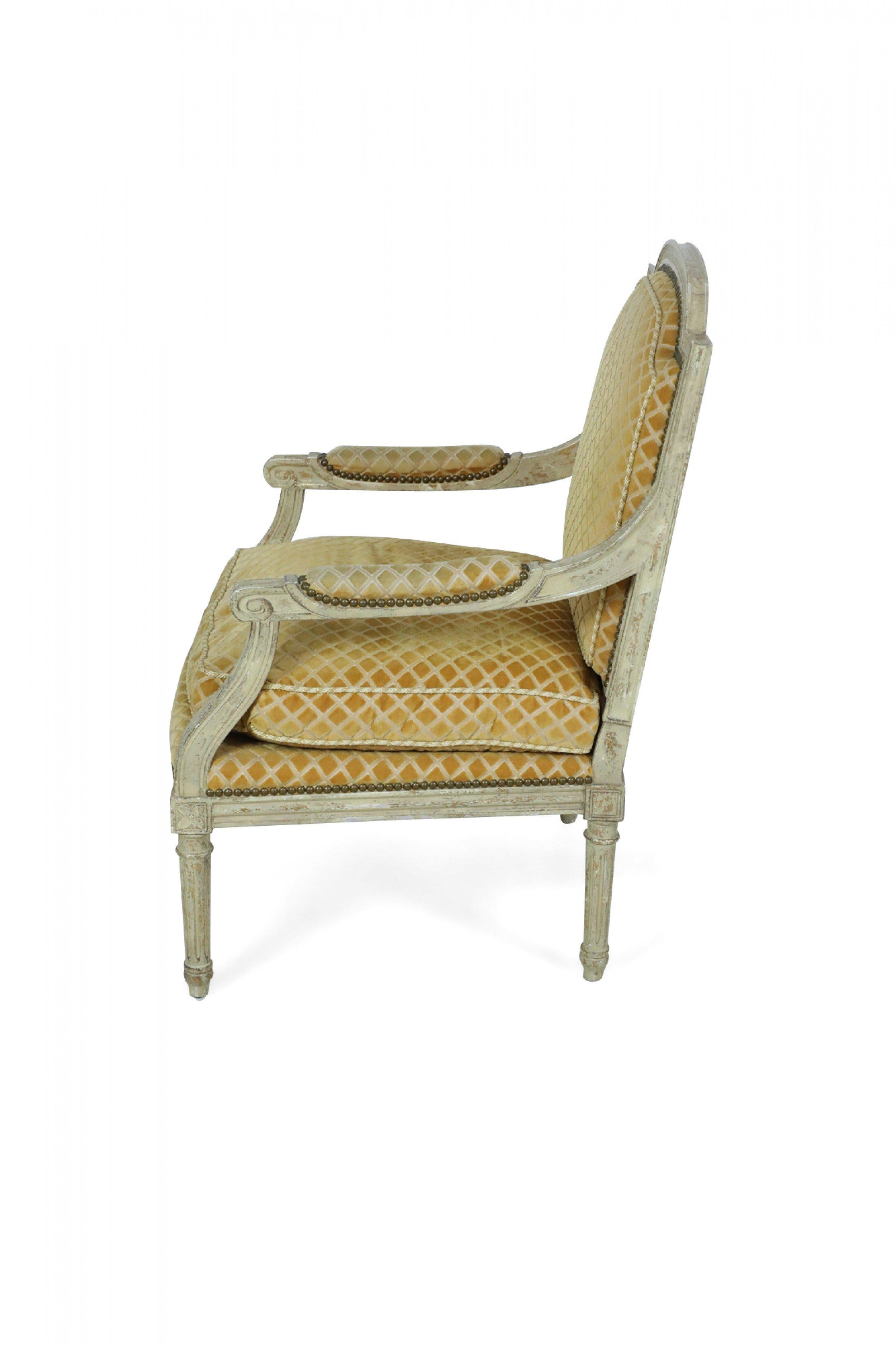 Pair of Louis XVI-Style Gold Upholstered Fauteuils / Armchairs For Sale 1