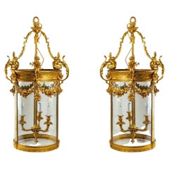 Pair of Louis XVI Style Lanterns in Gilt Bronze