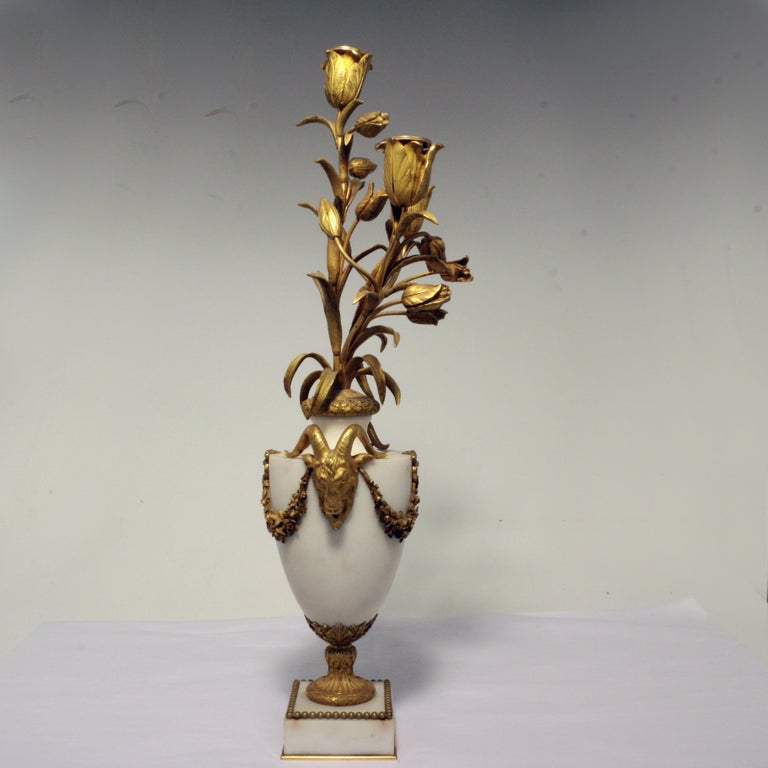 Pair of Louis XVI Style Marble and Gilt Bronze Candelabra In Good Condition For Sale In Montreal, QC