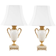 Paire de lampes en marbre de style Louis XVI