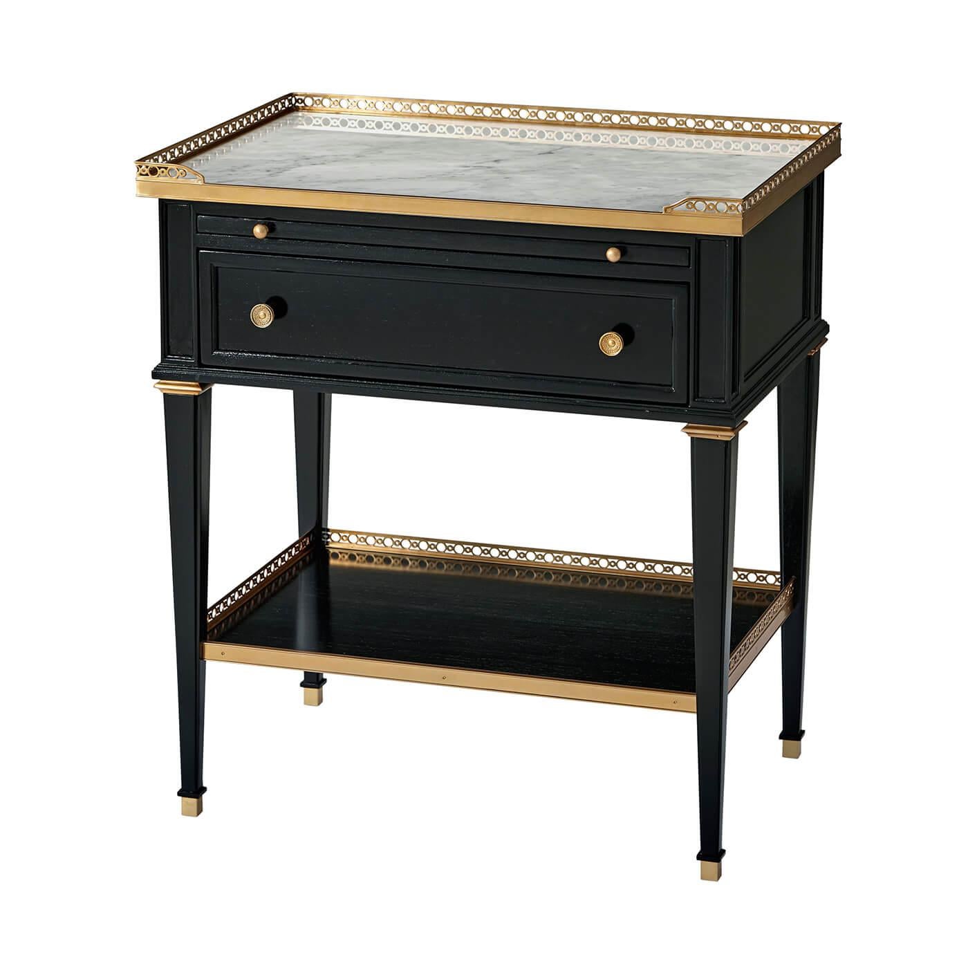 A French Louis XVI style neoclassical nightstand, with a pierced brass gallery and Bianco Carrara marble top, pull-out tray, single drawer with cast brass handles, square tapered legs with brass capitals and feet, and pierced brass gallery lower