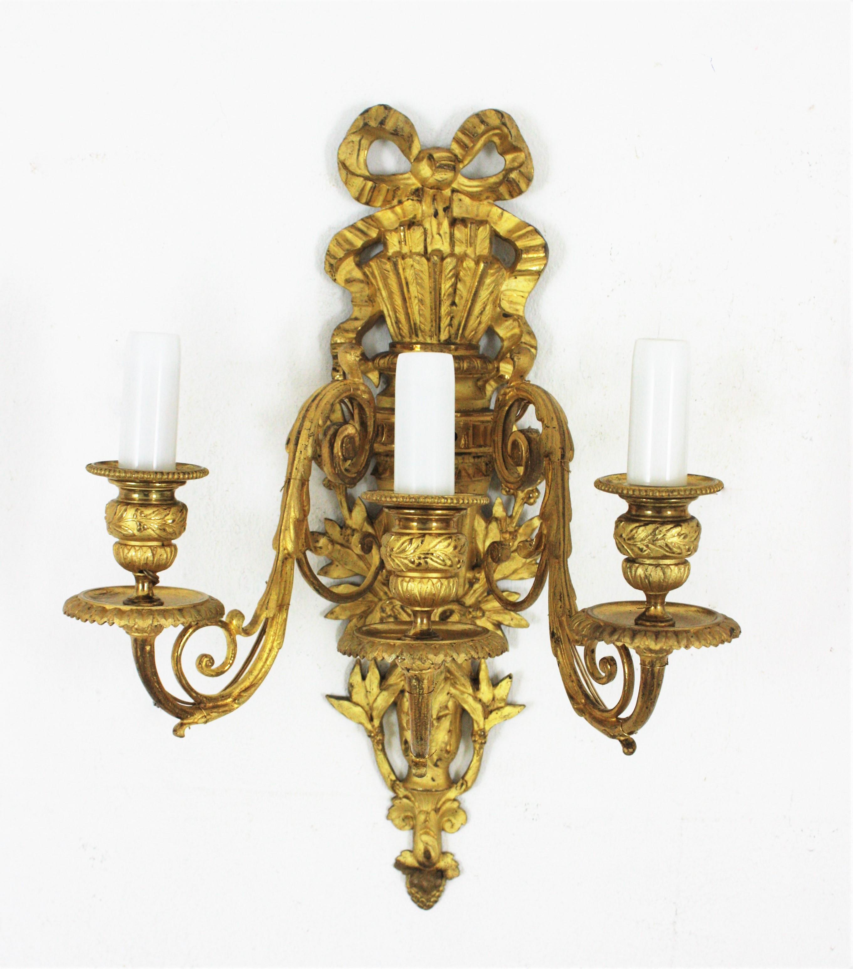 Bronze Pair of French Louis XVI Style Sconces in Ormolu For Sale