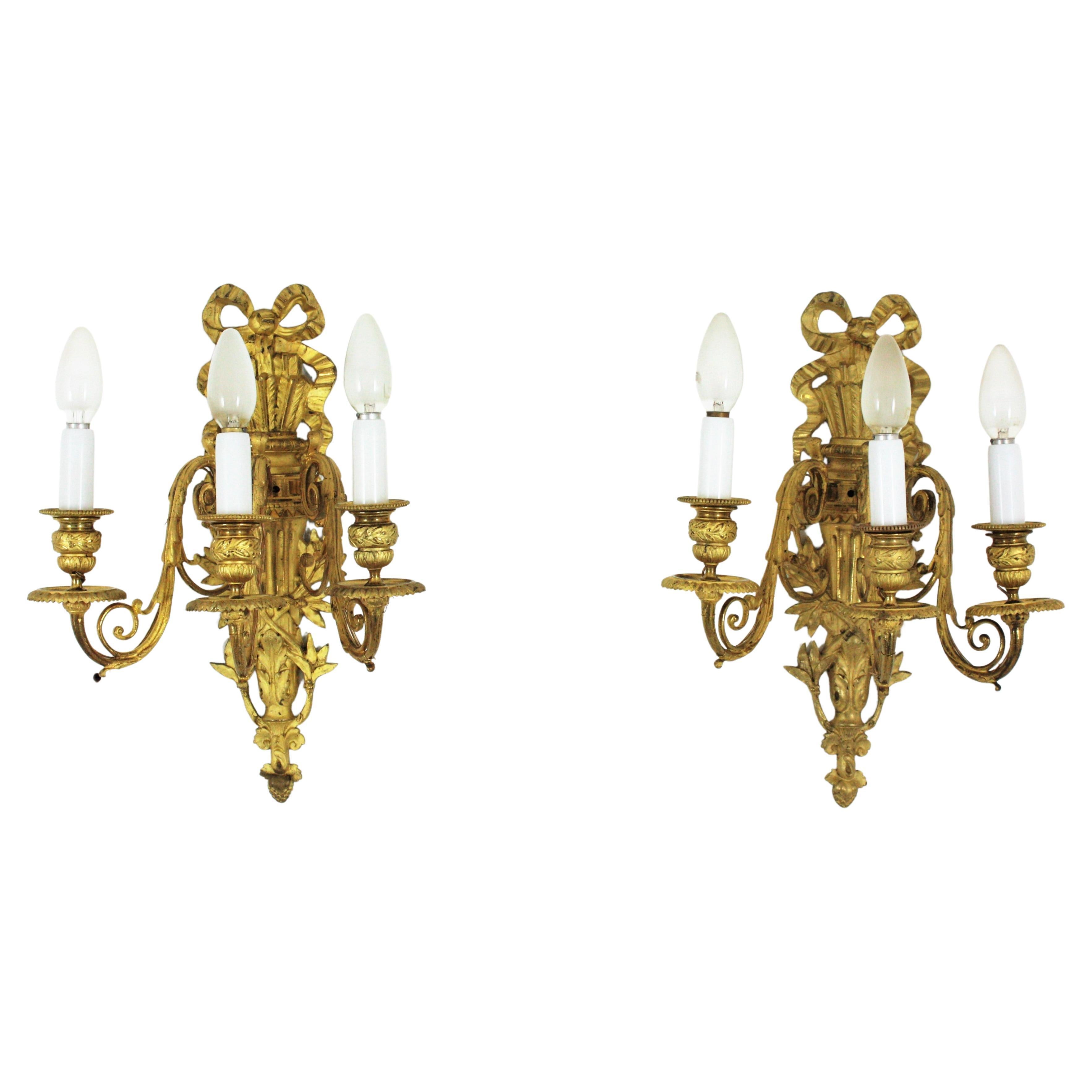 Pair of French Louis XVI Style Sconces in Ormolu For Sale