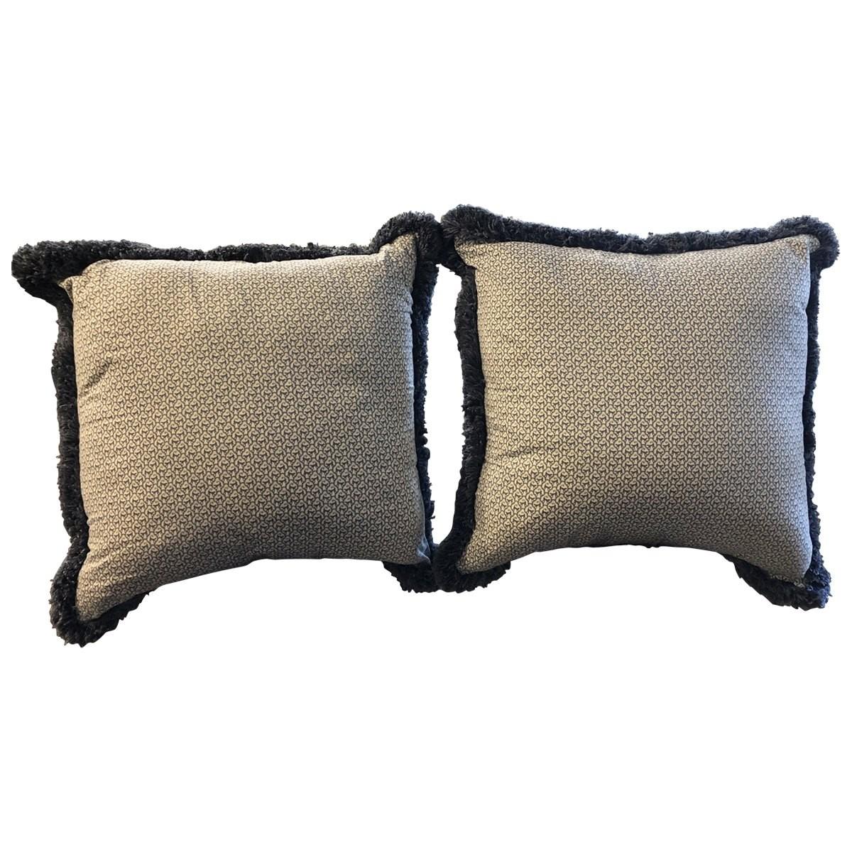These oversized pillows are elegant and charming. These down-filled zippered pillows feature a yellow background with blue and white print with monkey pattern on back, mixing antiqued refinery and whimsical aesthetics. These are great accent pieces