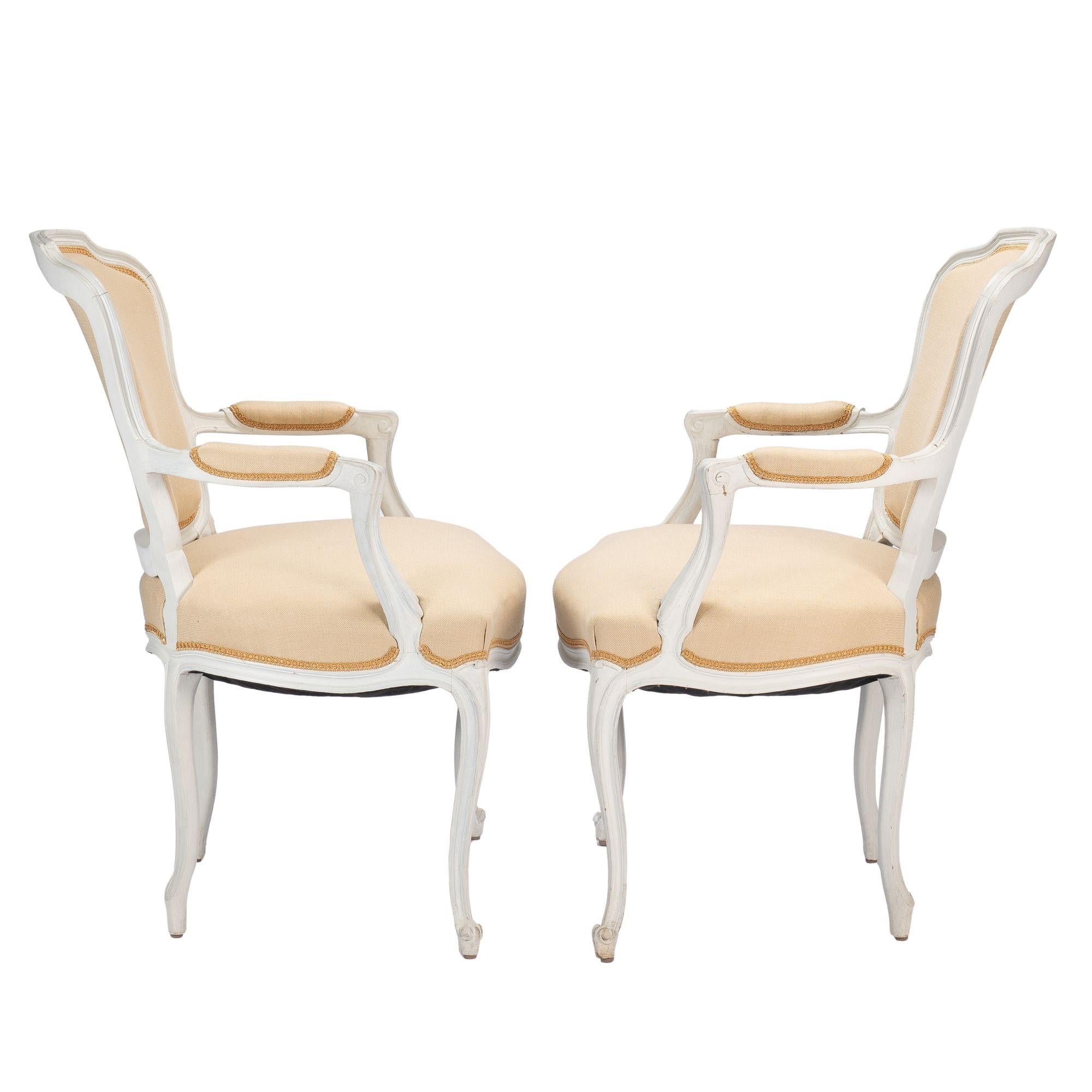 Pair of Louis XVI style painted & upholstered fauteuil, 1910-30 In Good Condition For Sale In Kenilworth, IL