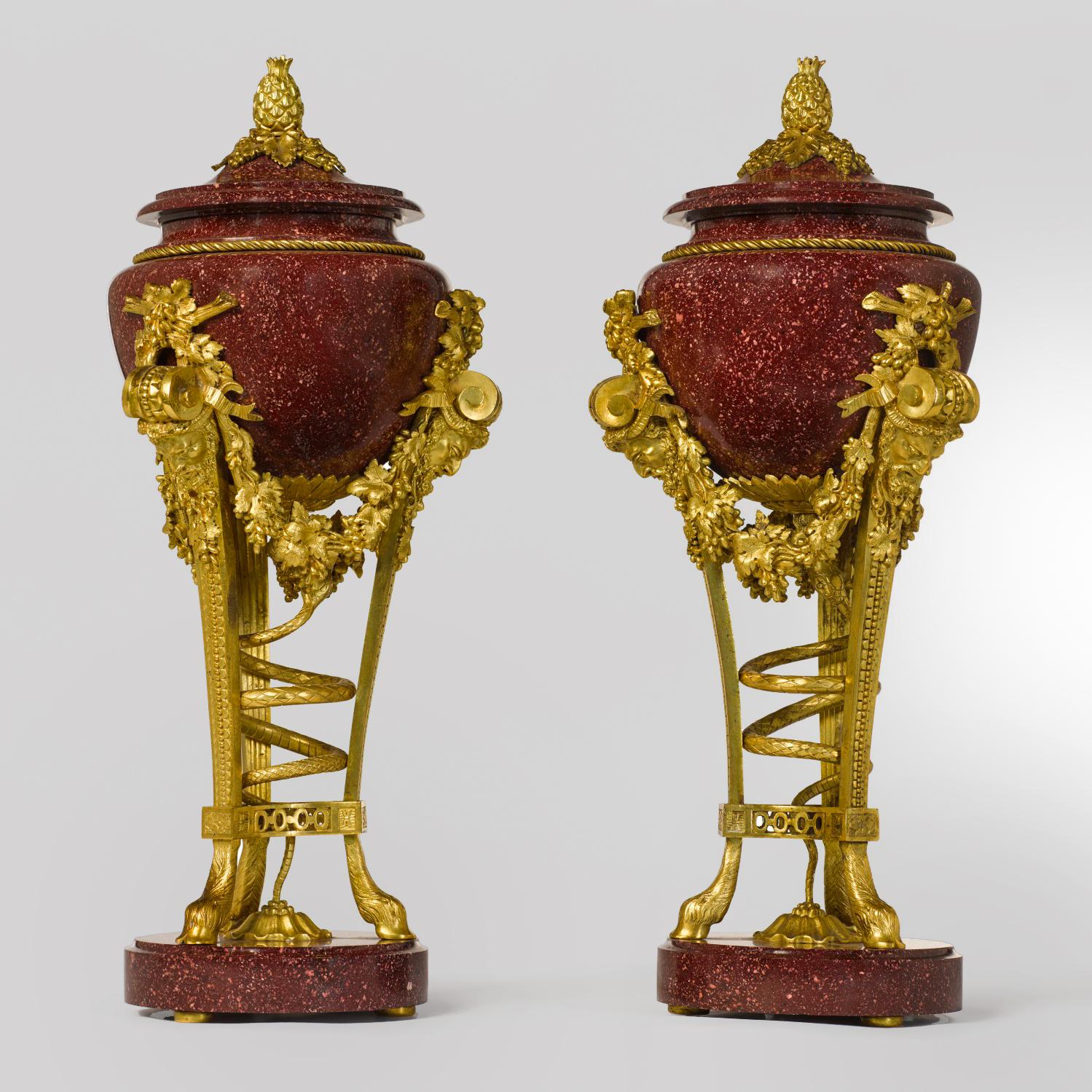 French Pair of Louis XVI Style Porphyry Urns, after Pierre Gouthière For Sale