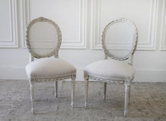 Pair of Louis XVI Style Ribbon Carved Cane Back Side Chairs
