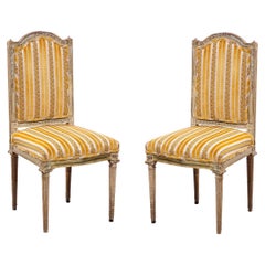 Paire de chaises d'appoint de style Louis XVI