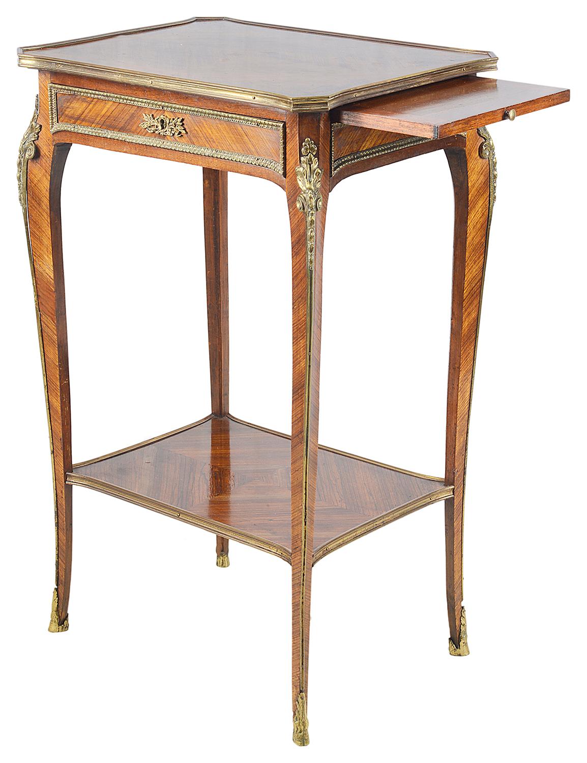 A good quality pair of French Louis XVI style Kingwood side tables, each with a single frieze drawer, gilded ormolu mounts, raised on elegant cabriole legs and a shelf beneath, circa 1900.