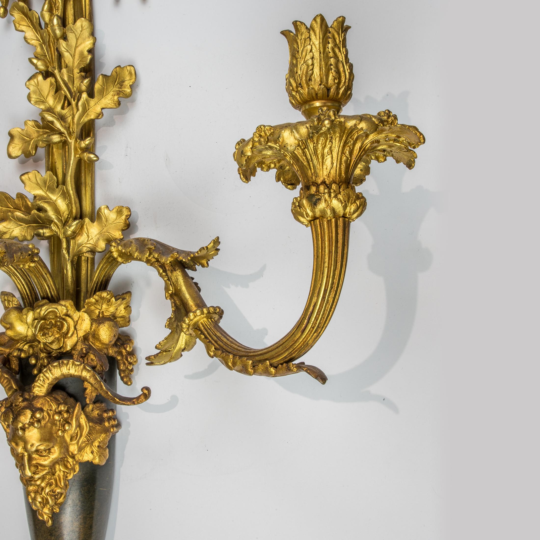 19th Century Pair of Louis XVI Style Three-Light Gilt and Patinated Bronze Wall Sconces For Sale