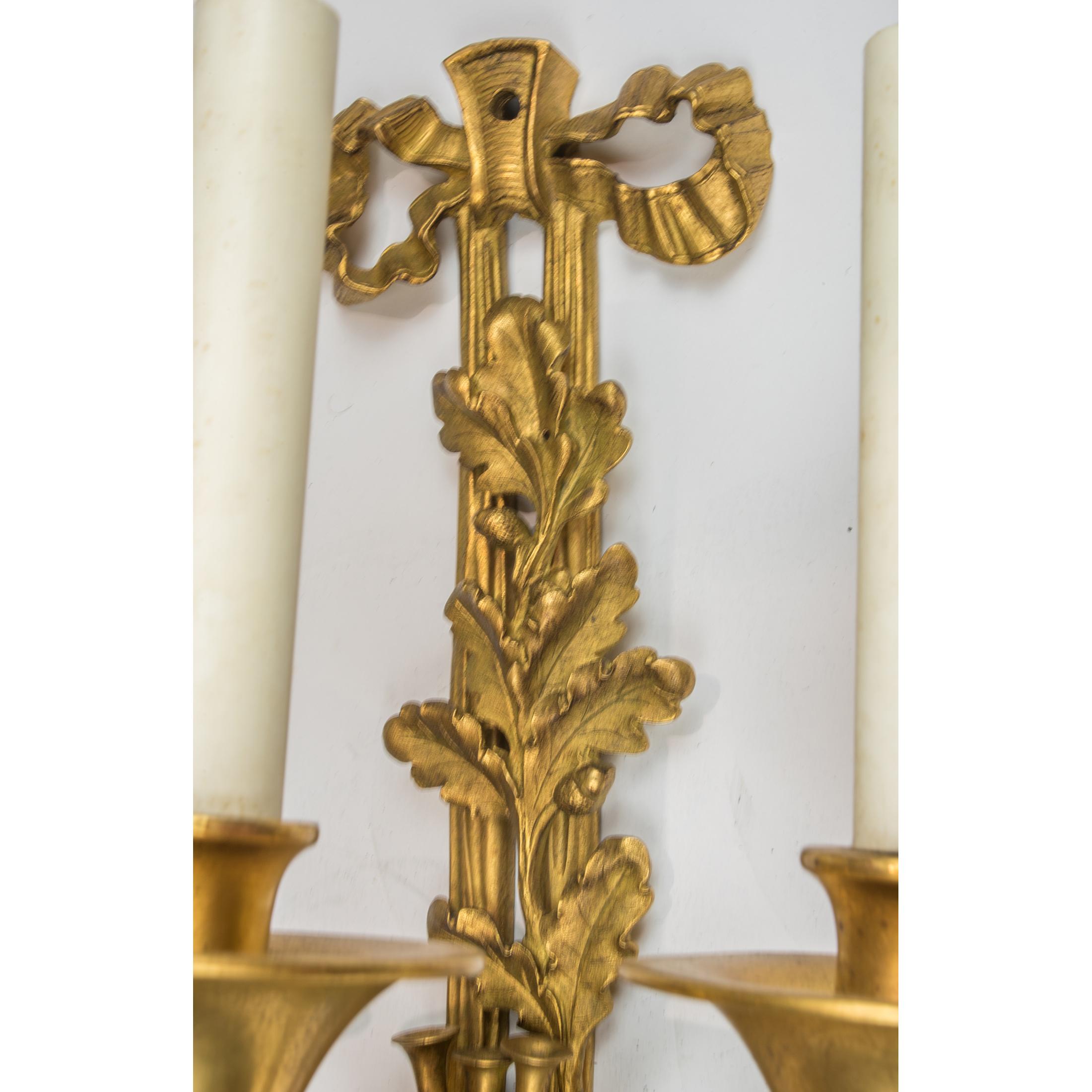 Pair of Louis XVI Style Three-Light Gilt Bronze Wall Sconces For Sale 1