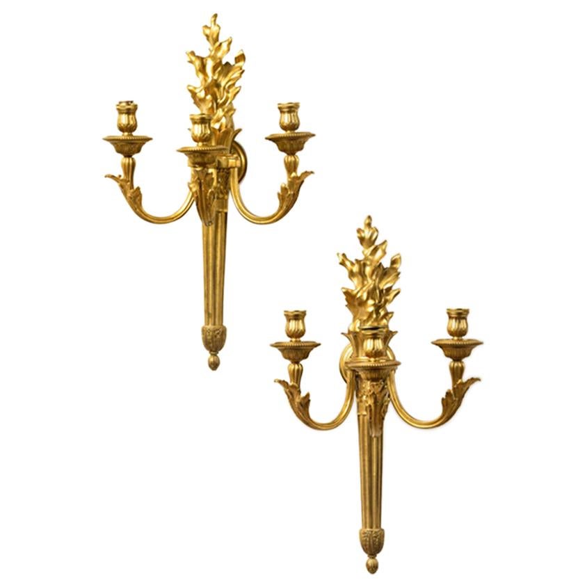 Pair of Louis XVI Style Three-Light Gilt Bronze Wall Sconces For Sale