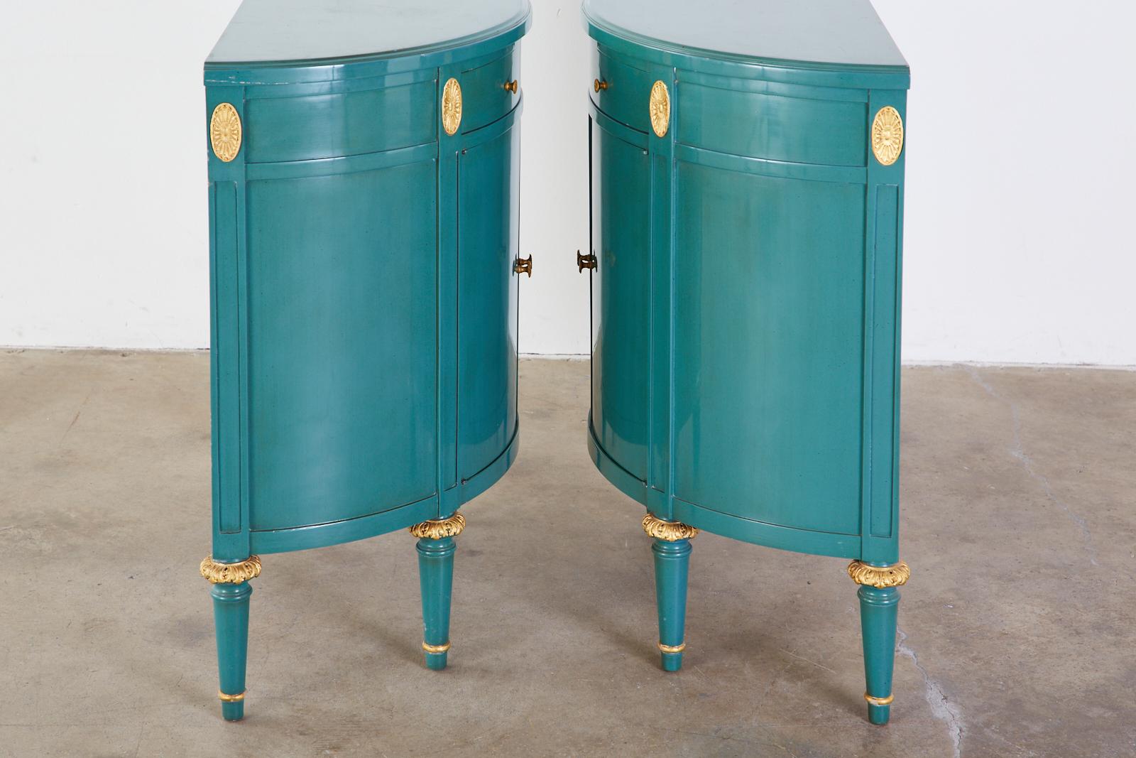 Gilt Pair of Louis XVI Style Turquoise Lacquered Demilune Cabinets