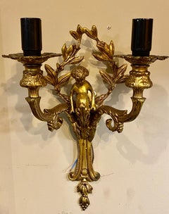 Pair of Louis XVI Style Wall Sconces Having Cherub and Ribbon Decorations