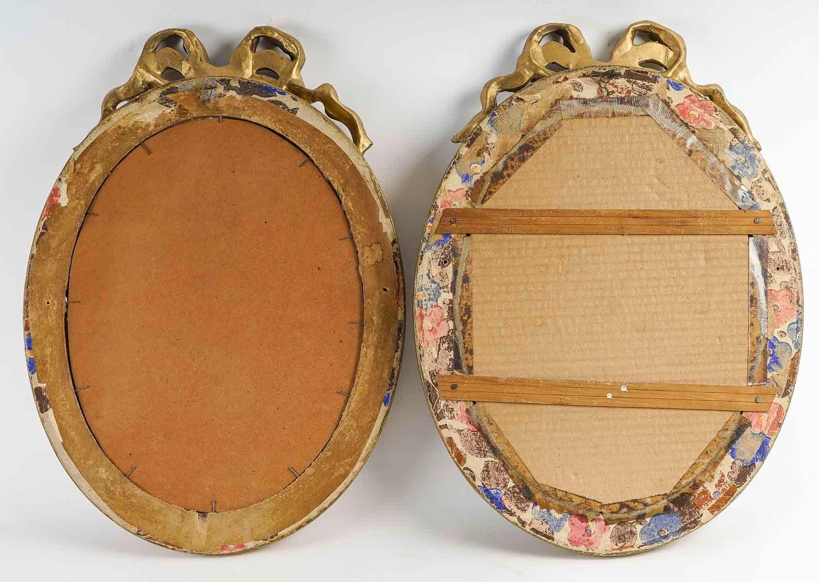 Pair of Louis XVI Style Wood and Gilded Stucco Mirrors, Early 20th Century. In Good Condition For Sale In Saint-Ouen, FR