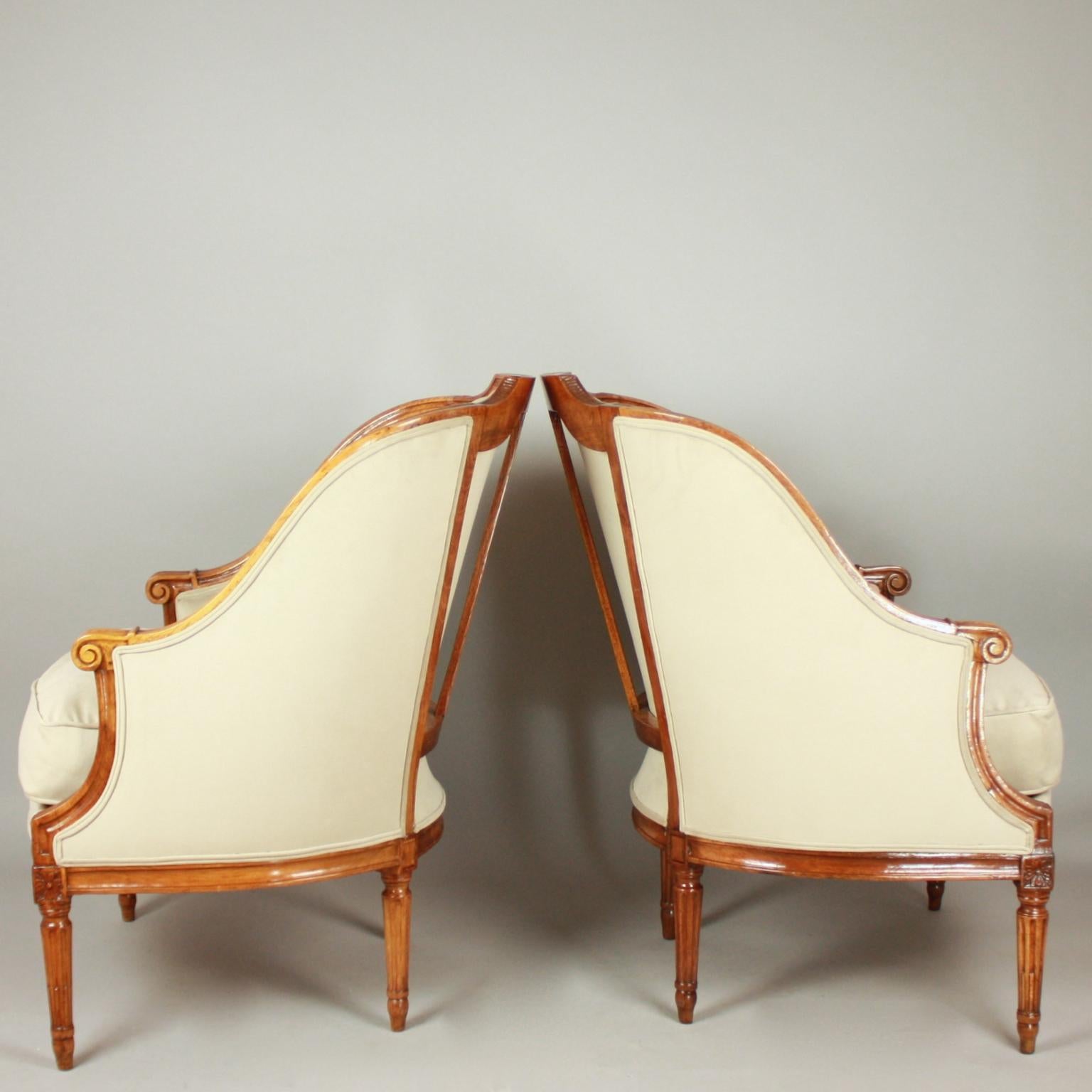Carved Pair of Louis XVI Walnut Bergeres or Armchairs, French, circa 1780