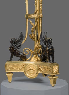 Pair of candlesticks. Bronze (blued and gilt). France, circa 1800.