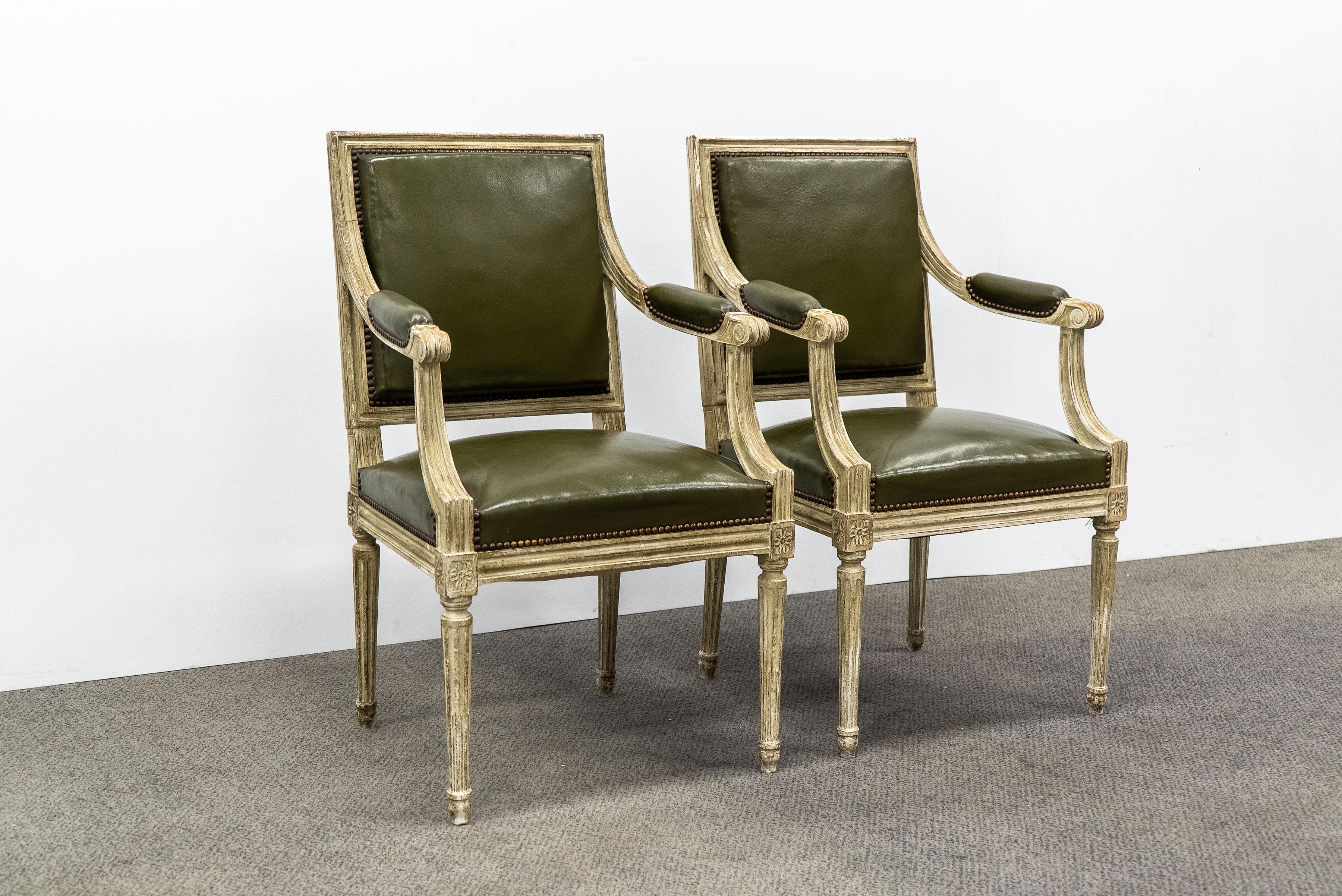 Pair of Louis XVI end chairs in original olive leather.