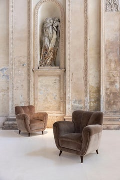 Pair of lounge armchairs by Osvaldo Borsani, Italy, circa 1940.