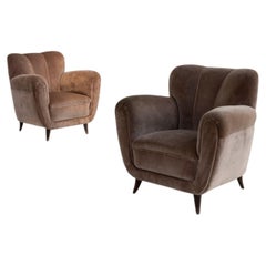 Pair of lounge armchairs by Osvaldo Borsani, Italy, circa 1940.