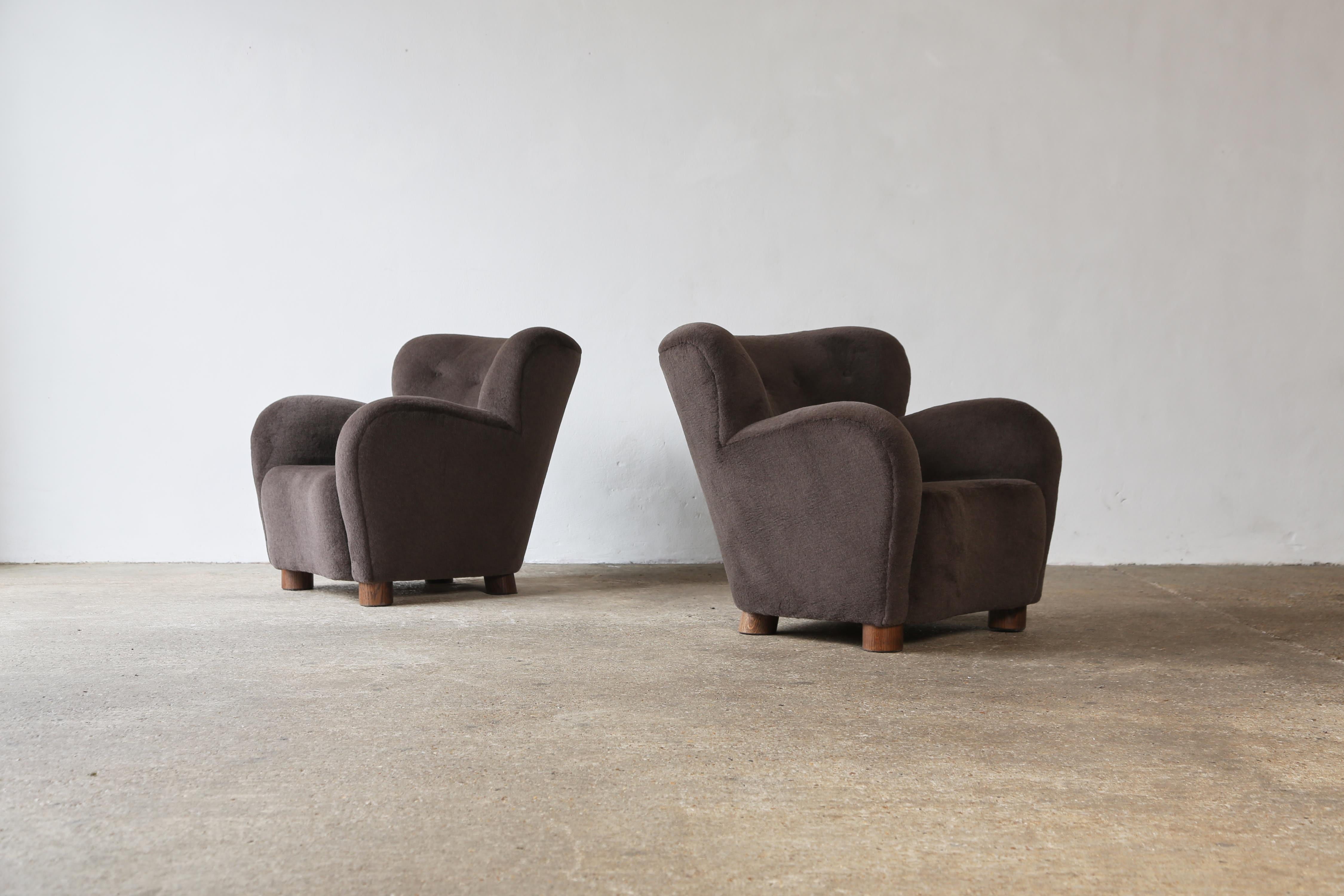 A superb pair of modern lounge chairs / armchairs.  Beech frames and sprung seats.  Newly upholstered in a premium, soft, pure alpaca wool fabric with solid oak feet.  Handmade in England.  Fast shipping worldwide.


