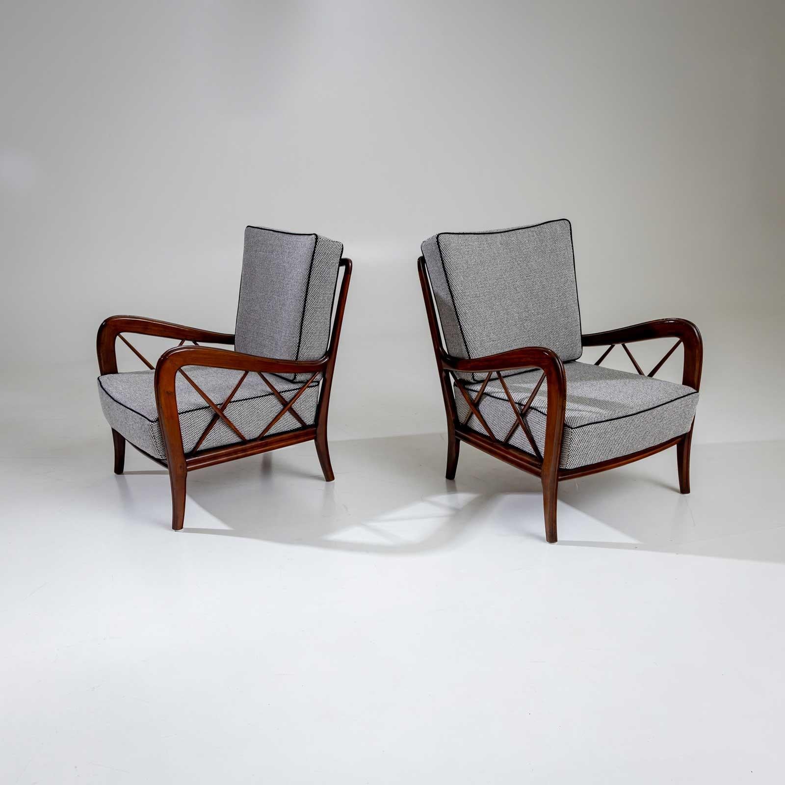 Pair of grey upholstered lounge chairs, attributed to the Italian designer Paolo Buffa (Italy, 1903-1970). The elegant curved frames made of solid cherry have been polished and the seat cushions are newly upholstered. Like the sides, the back