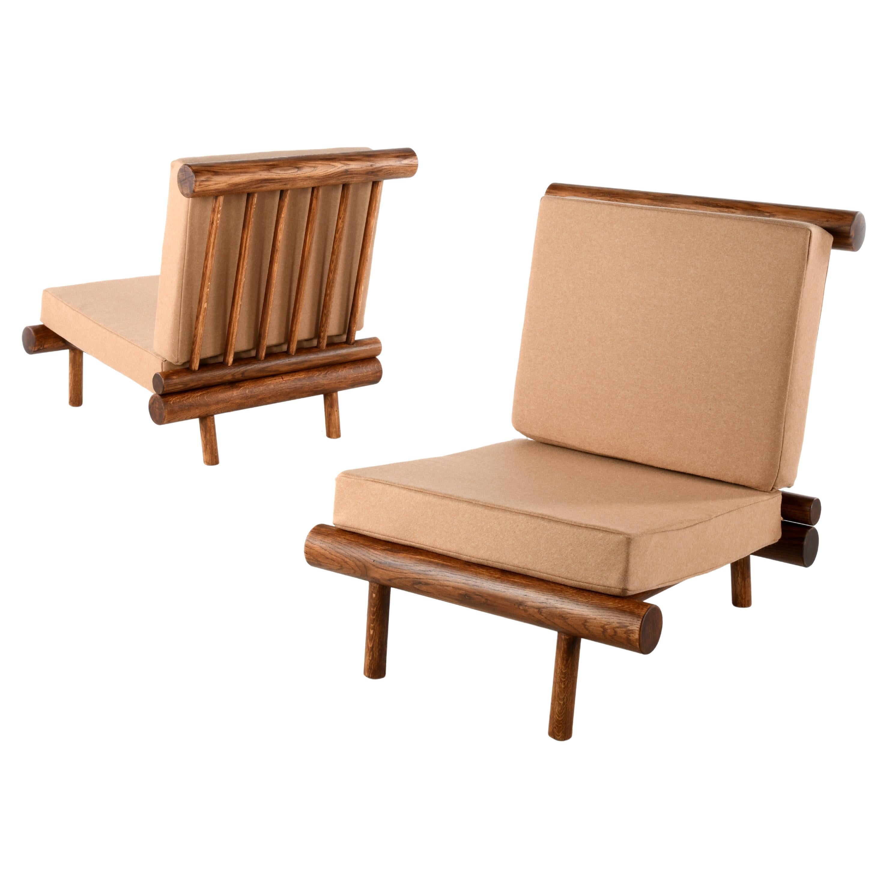 Pair of lounge chairs attributed to Charlotte Perriand, France in the 60s For Sale