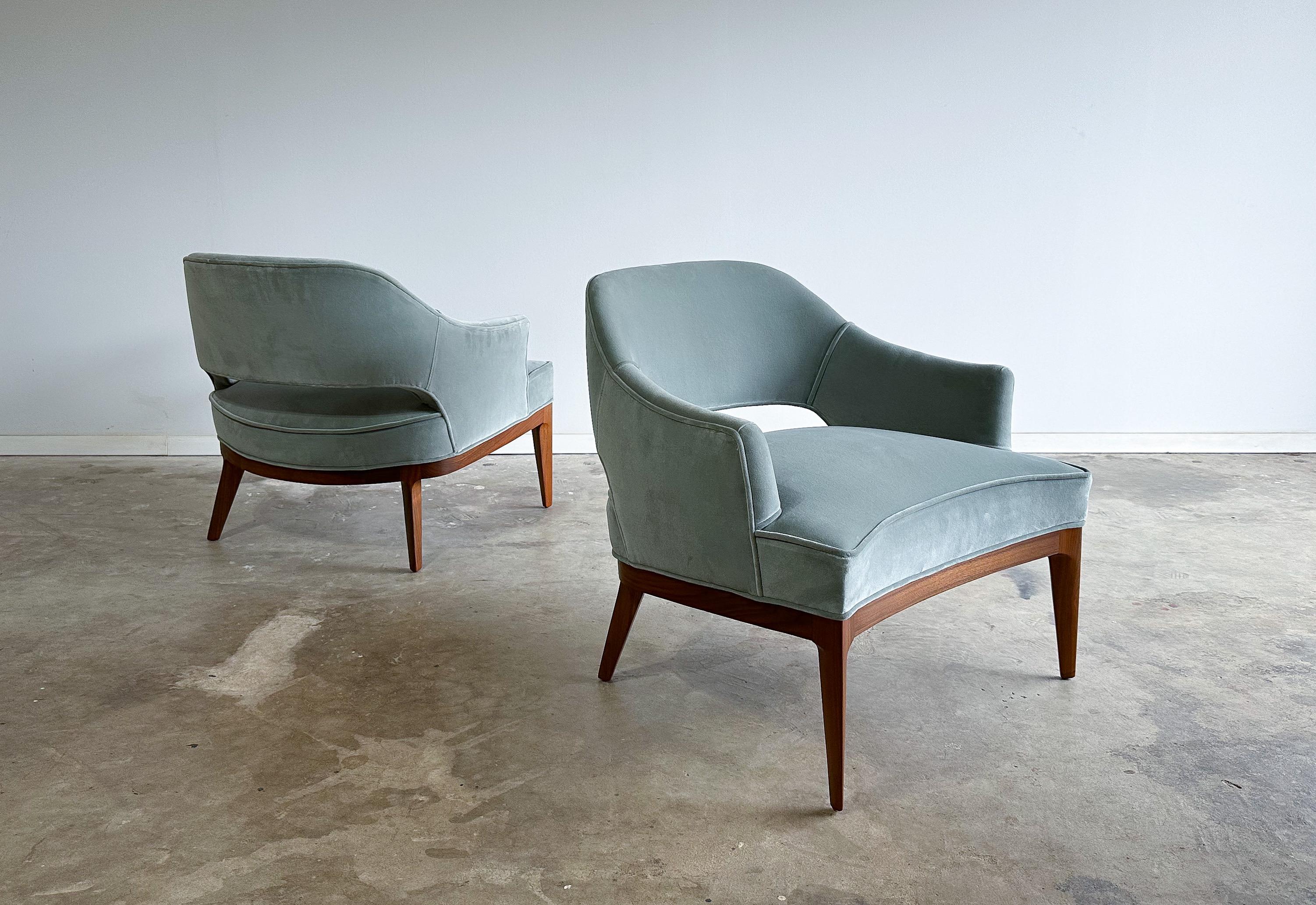 A stunning pair of mid-century modern lounge chairs attributed to Harvey Probber. 

Made by Erwin Lambeth- a company known for their high standards in quality. Featuring solid walnut frames, with highly sculpted knife edge style legs. The frames